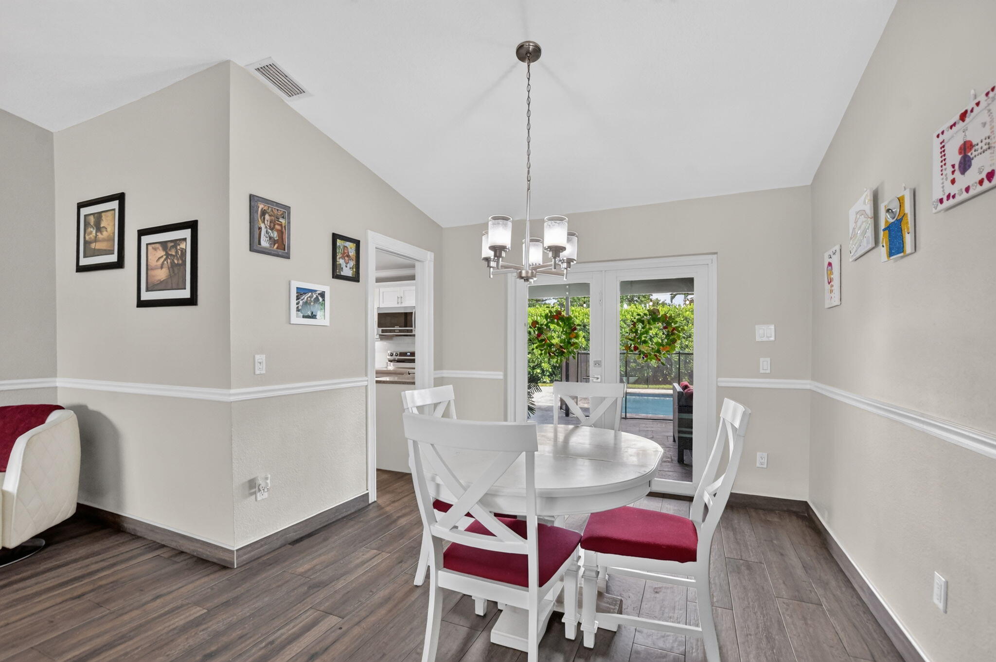 French doors lead out to patio and pool
