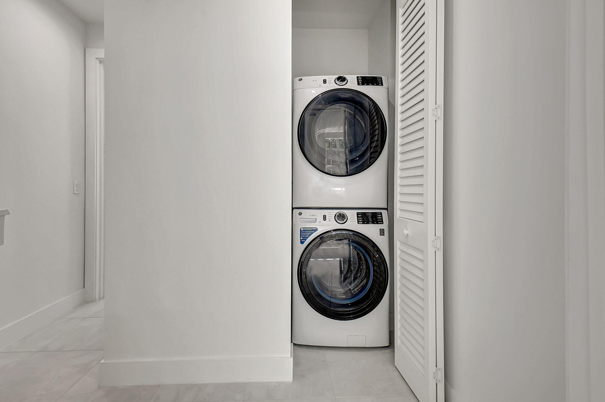 large capacity washer and dryer just off bedrooms