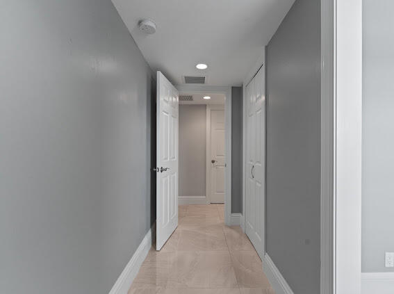 2nd Hallway Leading to 3rd Bedroom with small Closet