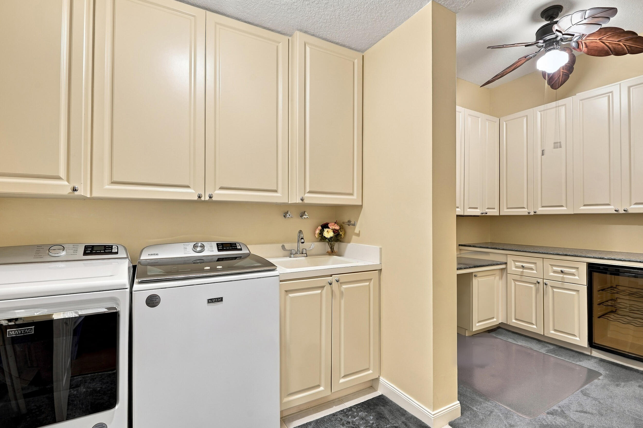 Laundry room with sink and lots of cabinet space