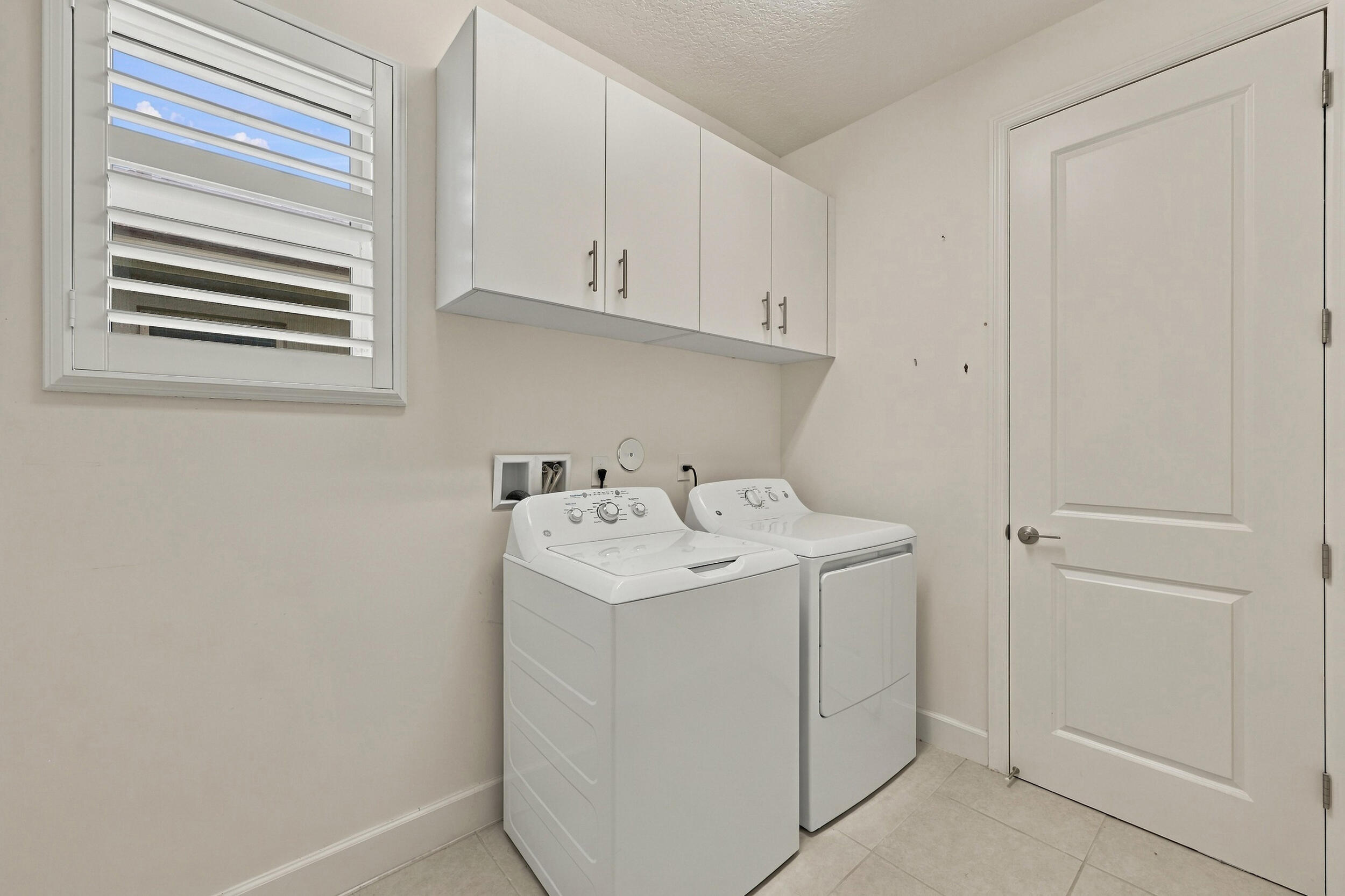 laundry room plus cabinets