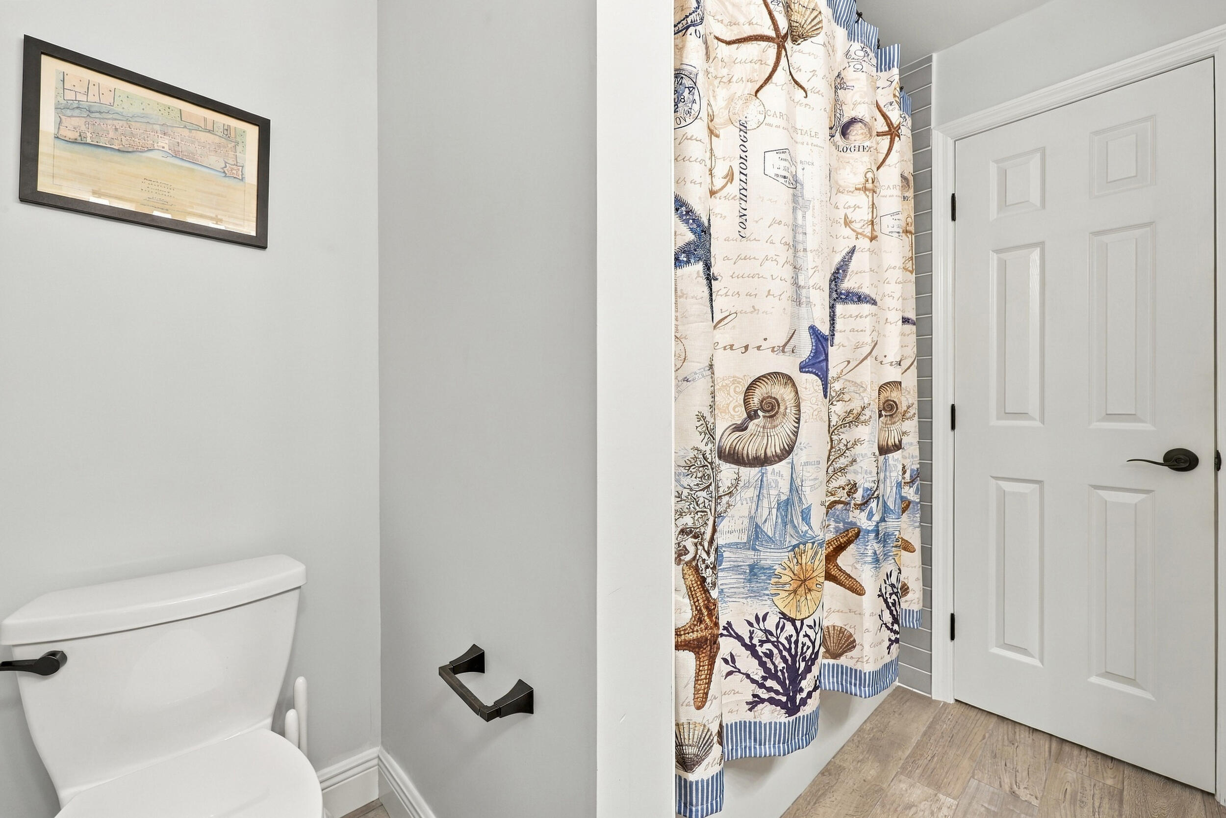 Bathroom 3 is a fully updated cabana bathroom with a new vanity, countertops, tile, and a tub and shower. Your guests will access it while spending days and evenings in the most beautiful backyard in Delray Beach.
