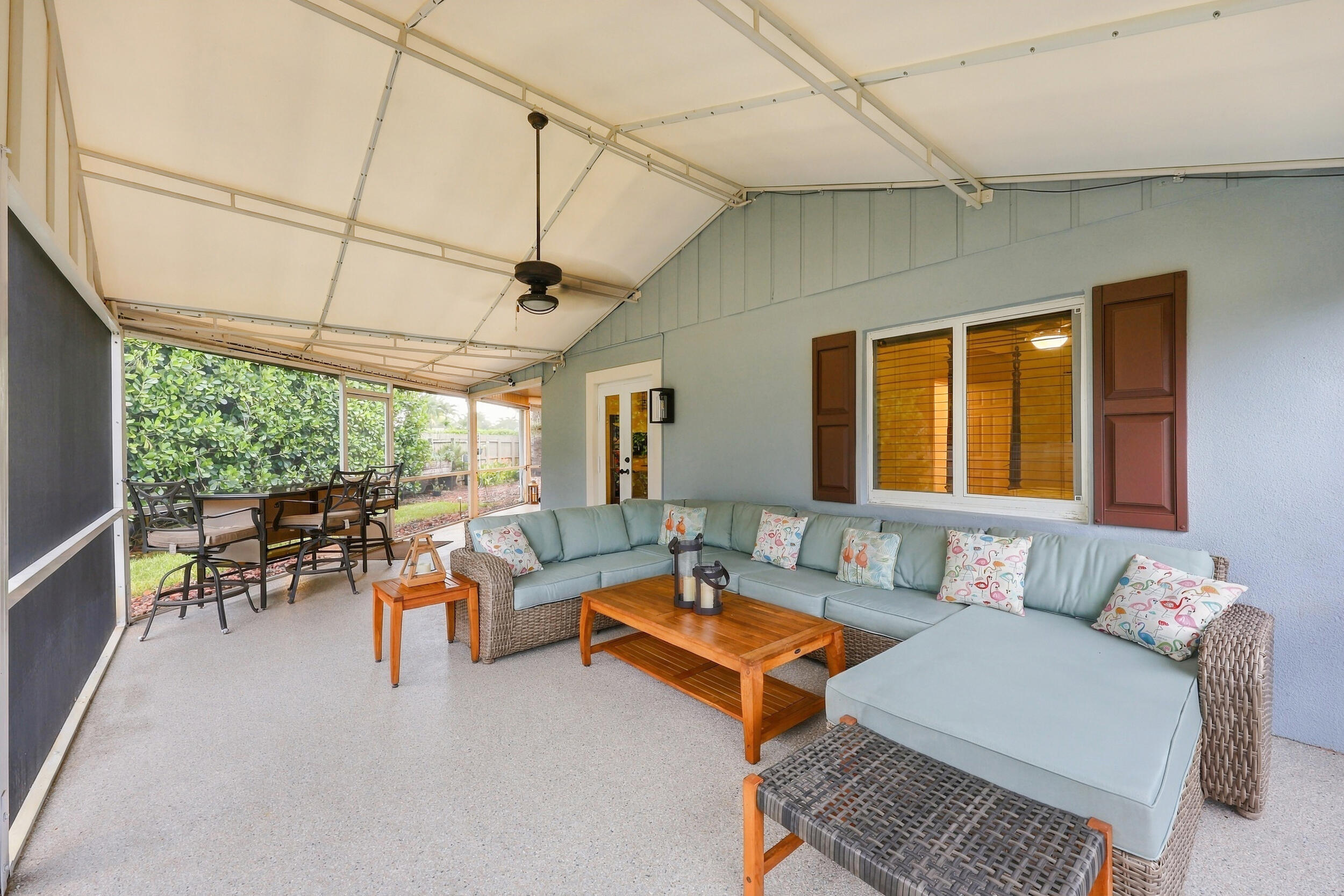 Live the epitome of the South Florida lifestyle with this 1,360 sq. ft. patio. It offers a built-in bar with quartz countertops, a grill area with hooded exhaust, eye-popping tongue & groove ceilings, recessed lights, tons of privacy and views of Lakeview Golf Course.