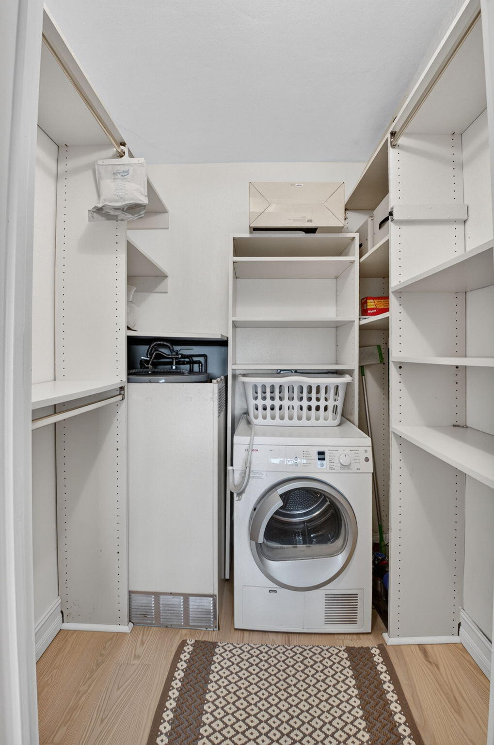 guest room walk incloset with dryer
