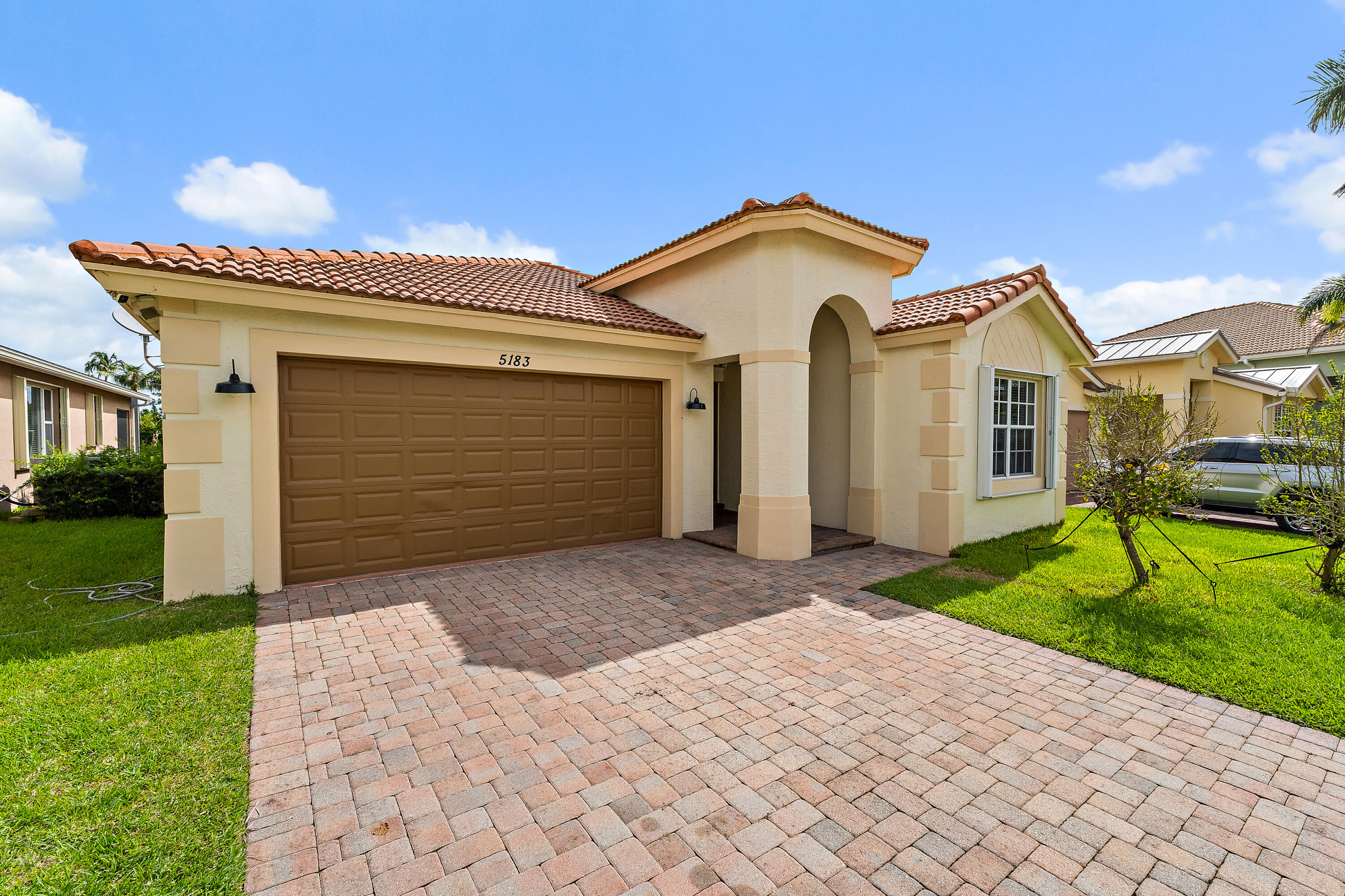 Large Garage and ample room to park in the driveway.