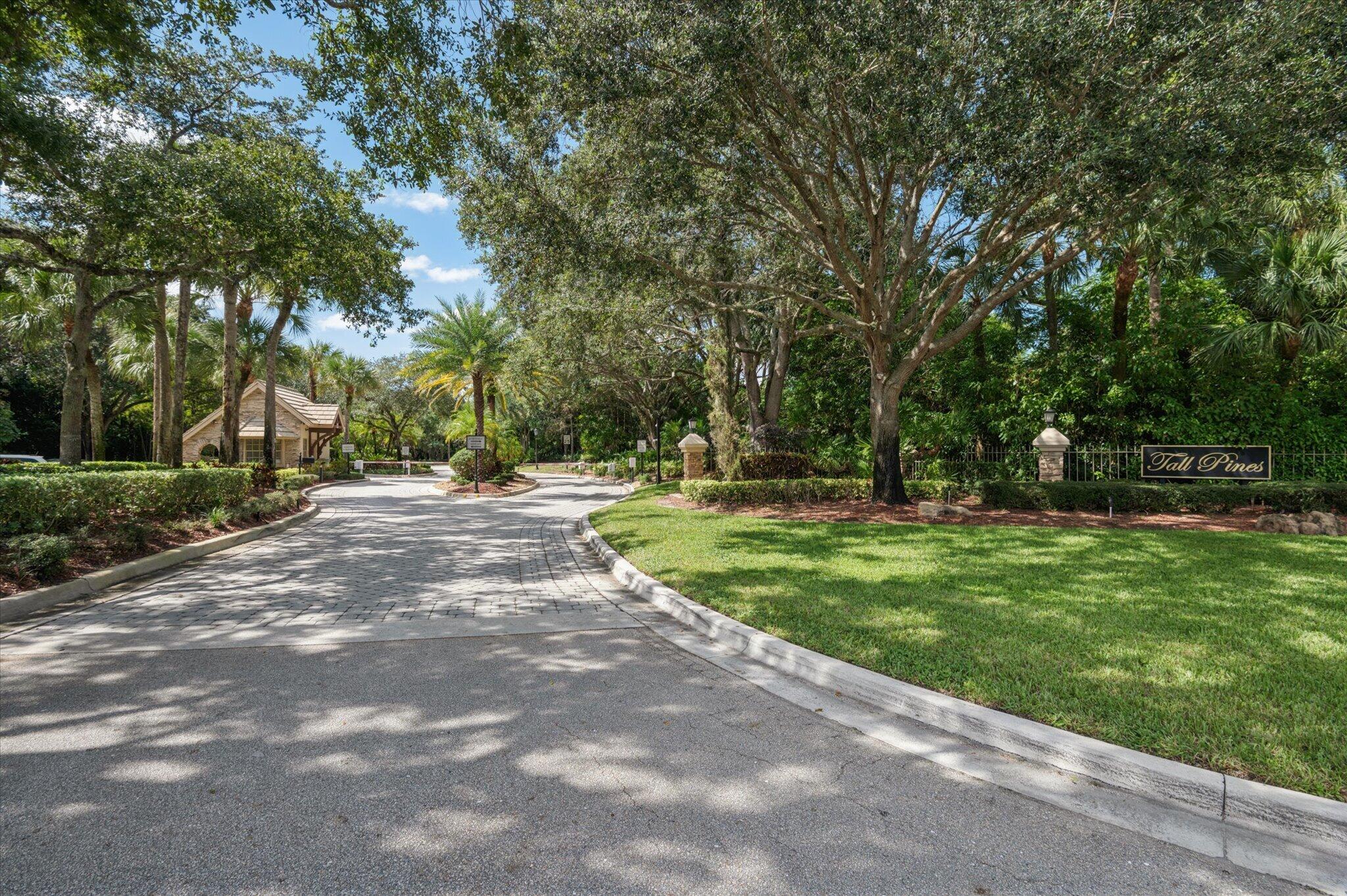 Beautiful gated and guarded entrance to Tall Pines