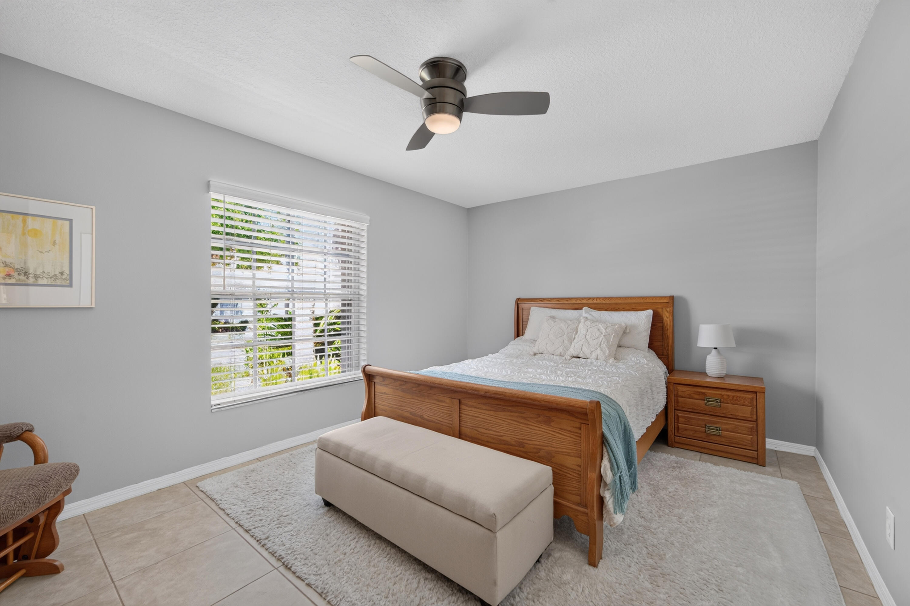 Large Second bedroom, with ceiling fan and large closet.