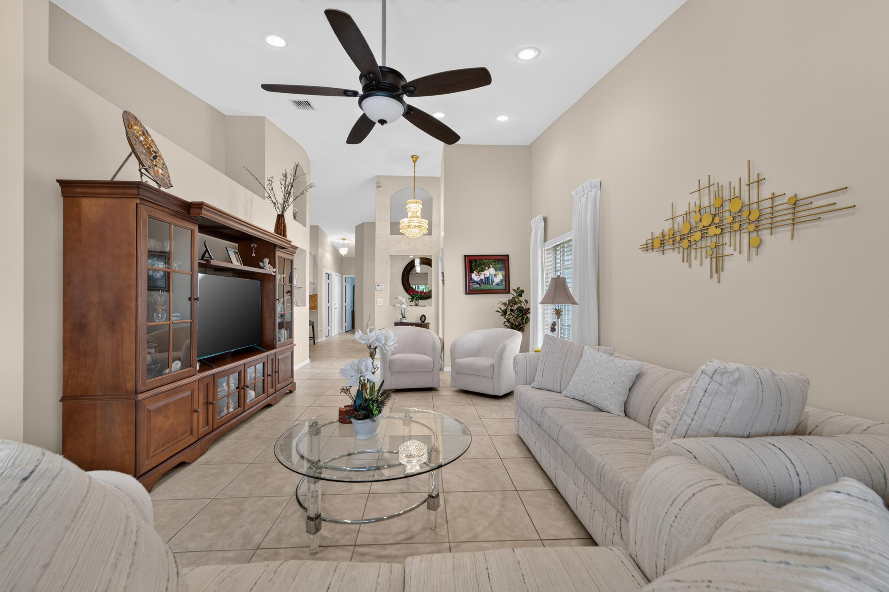Plenty of space for large tv or cabinet, plenty of seating for all.