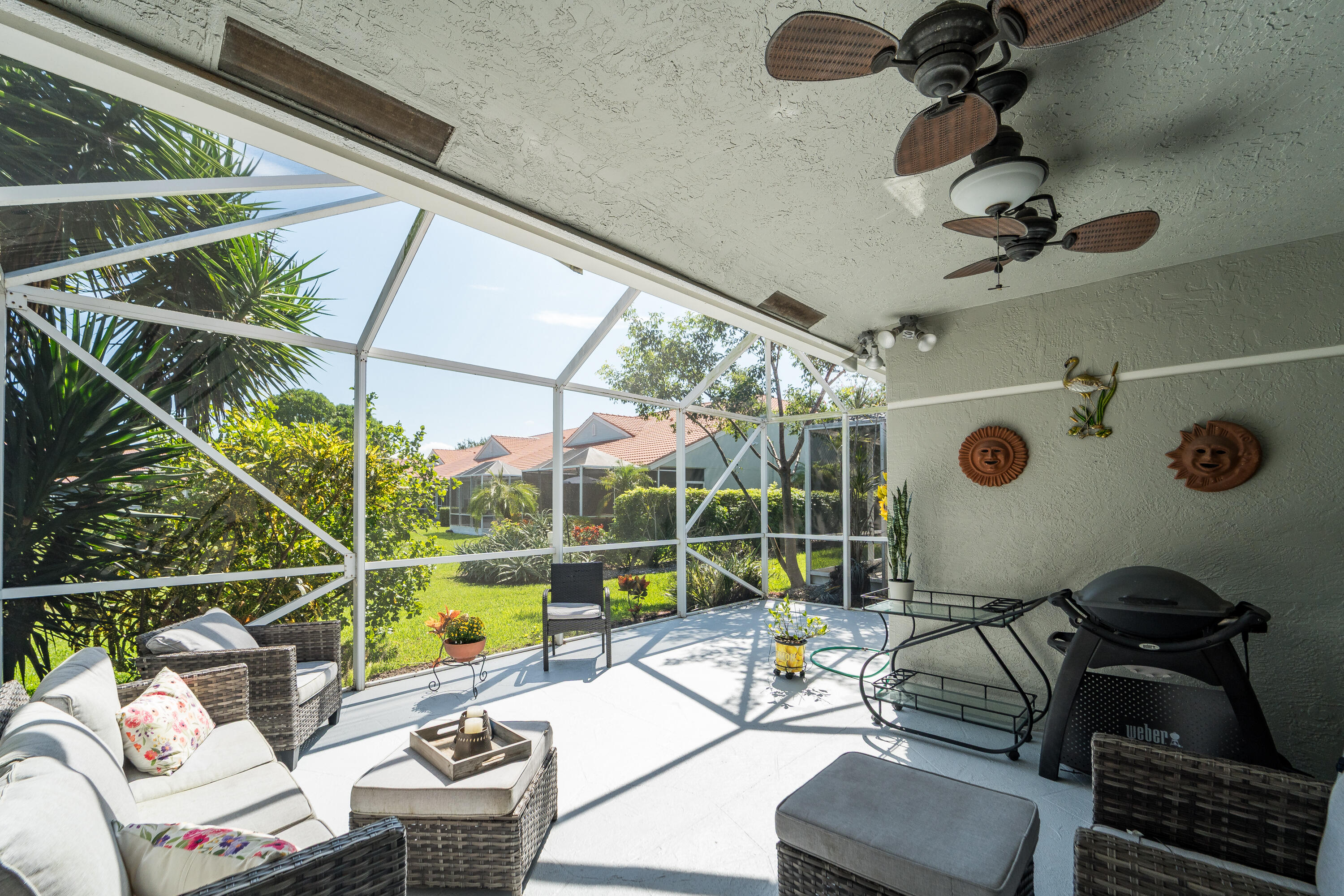 Extra wide and large East Exposure Patio with lights and ceiling fan. Room for dining in or outdoors.