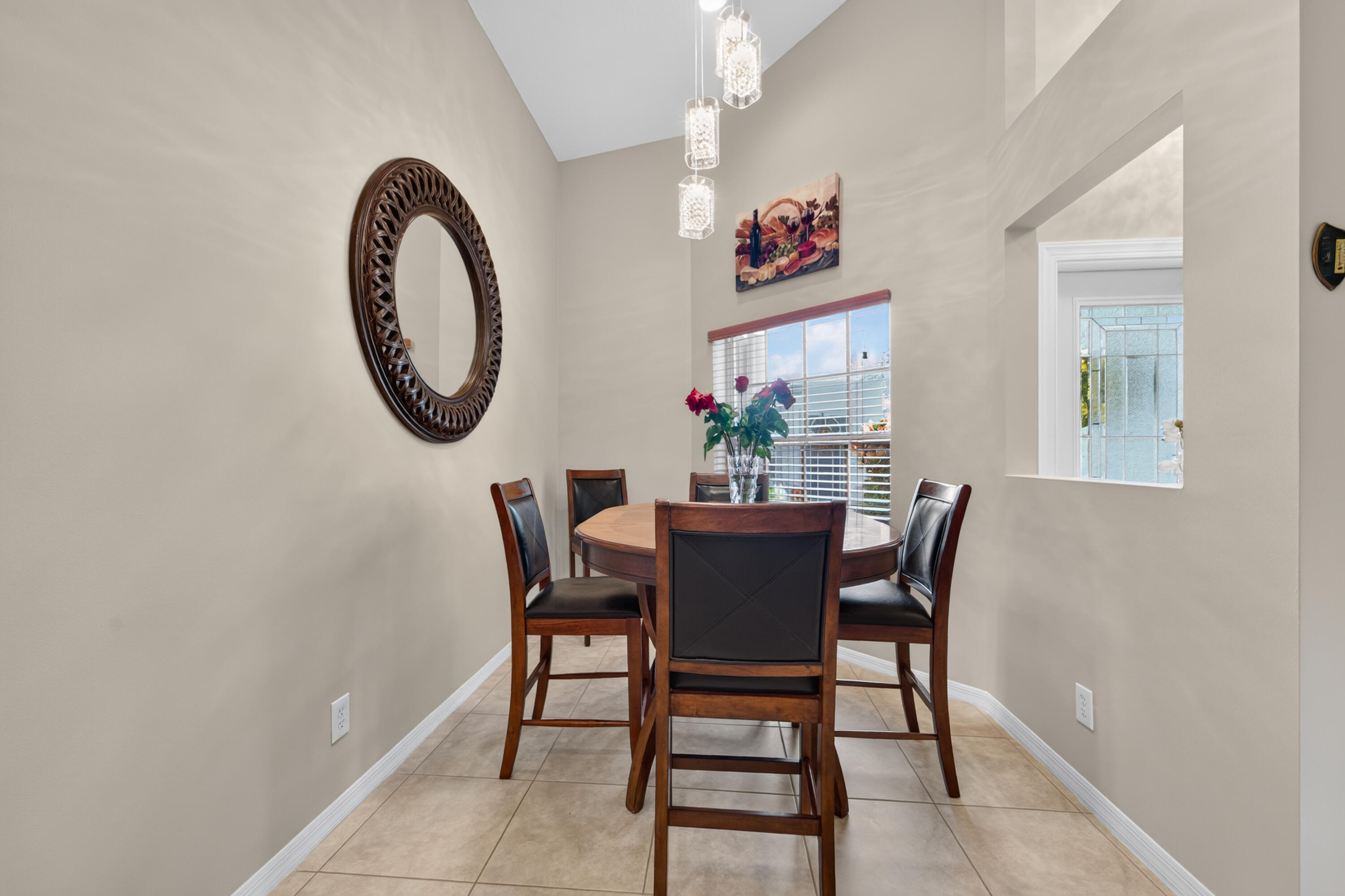 Off the kitchen a large eat in area for dining or just morning coffee. Vaulted, new lighting, and freshly painted interior as well as exterior.