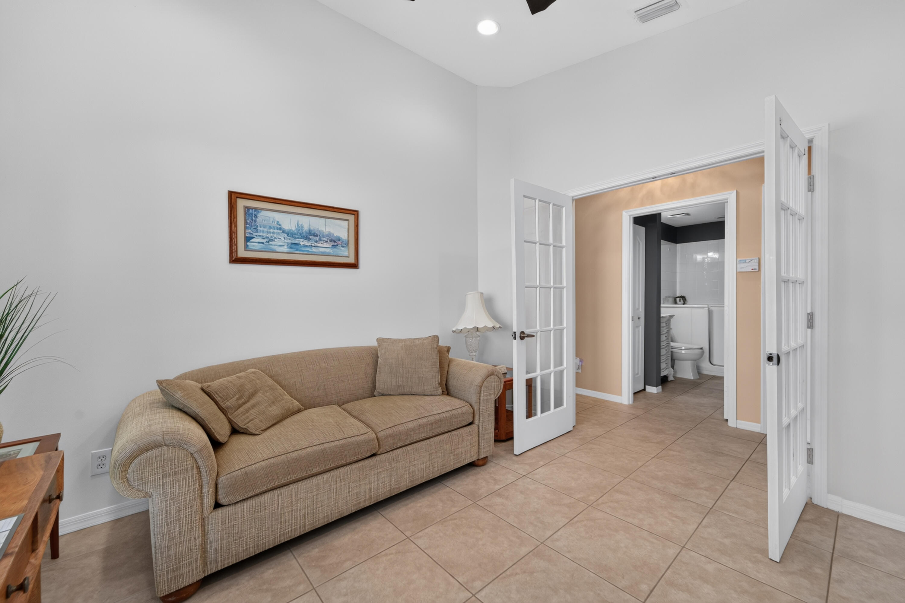 Den or 3rd bedroom with double pane glass doors