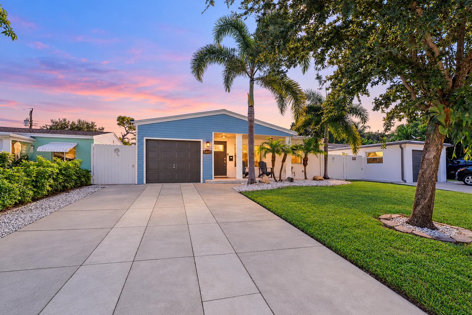 Bright twilight home with clean driveway Bright twilight home with clean driveway