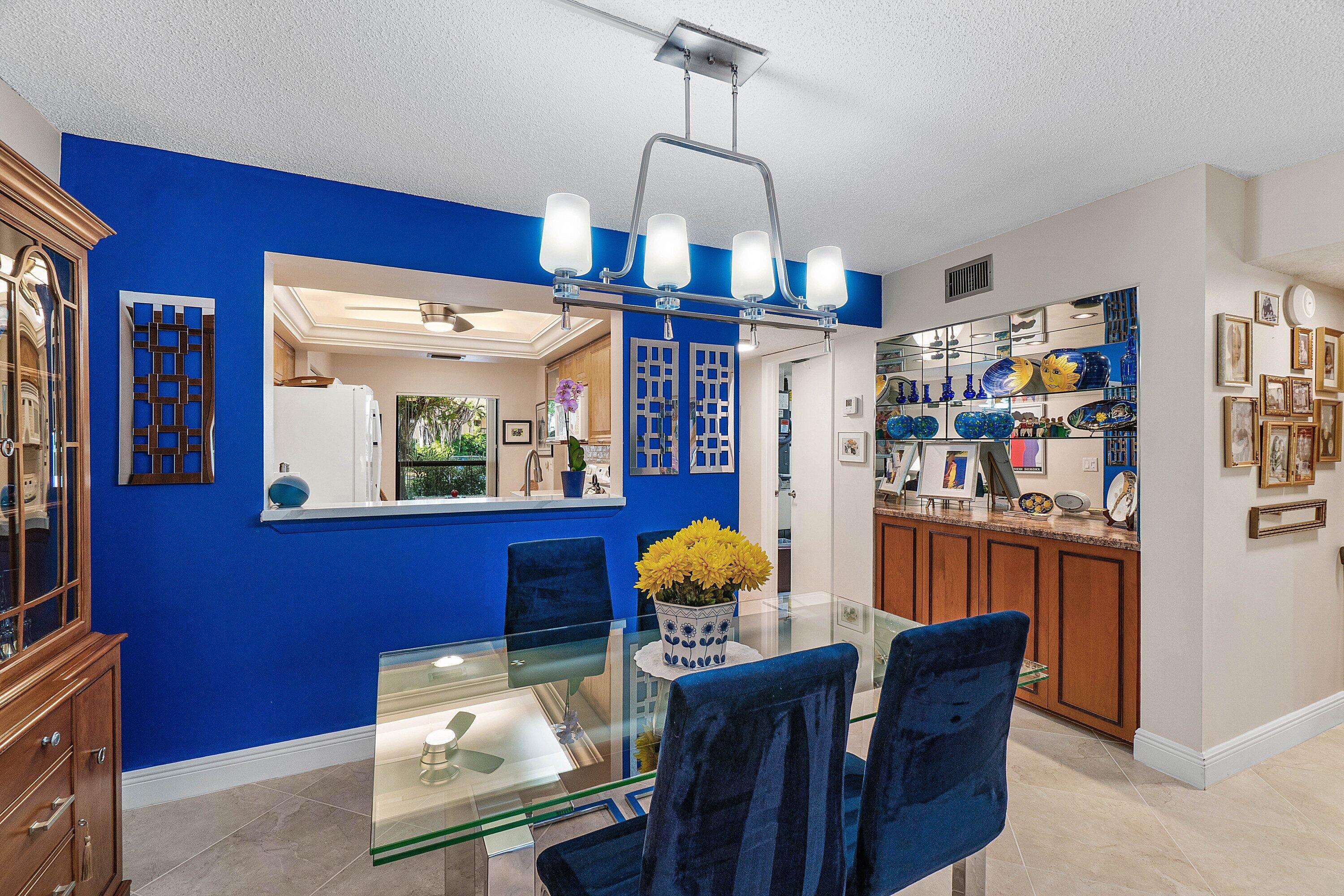 Dining Area w/ Large Opening to Kitchen
