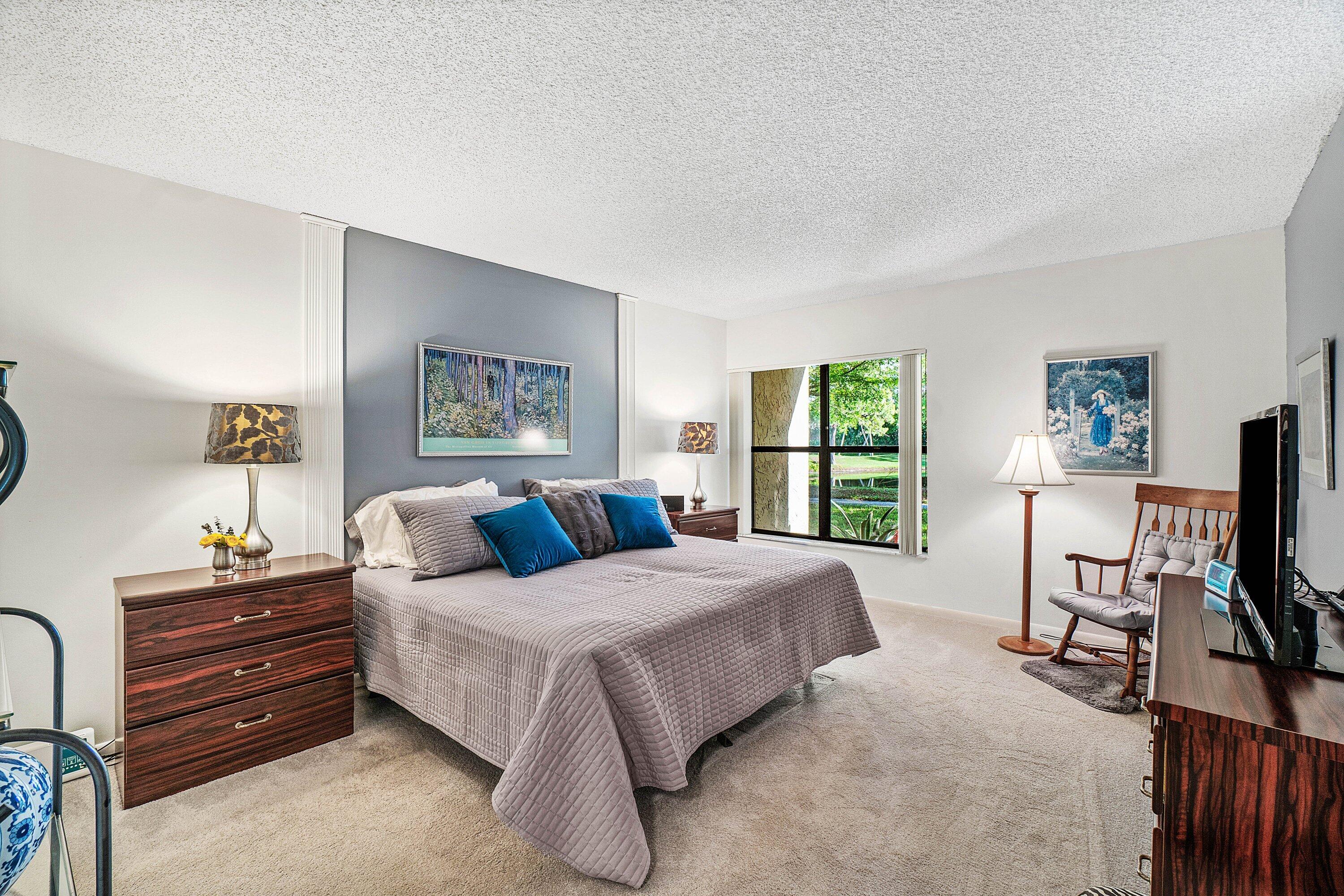 Primary Bedroom w/ Lake Views
