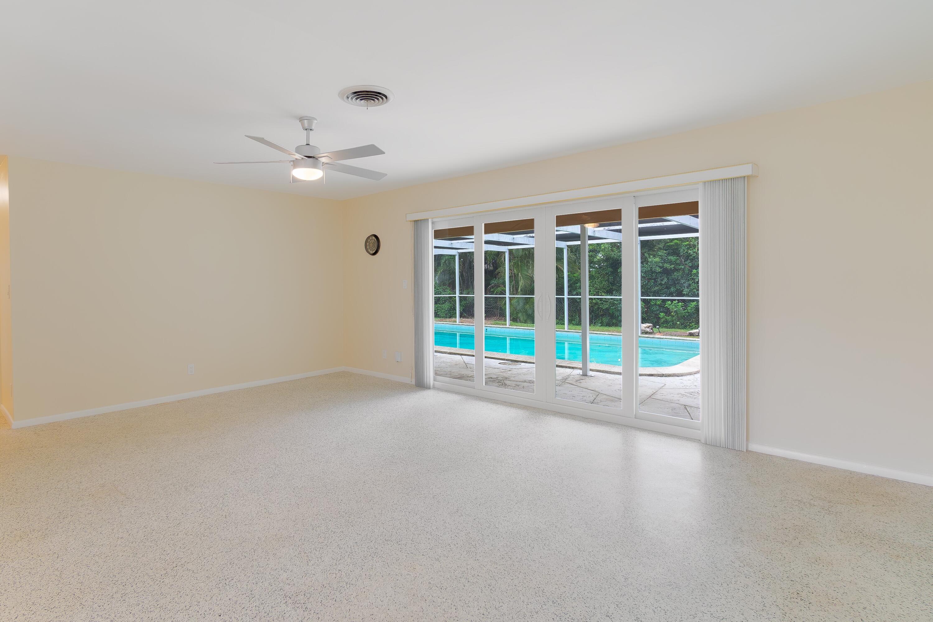 Living room with pool view