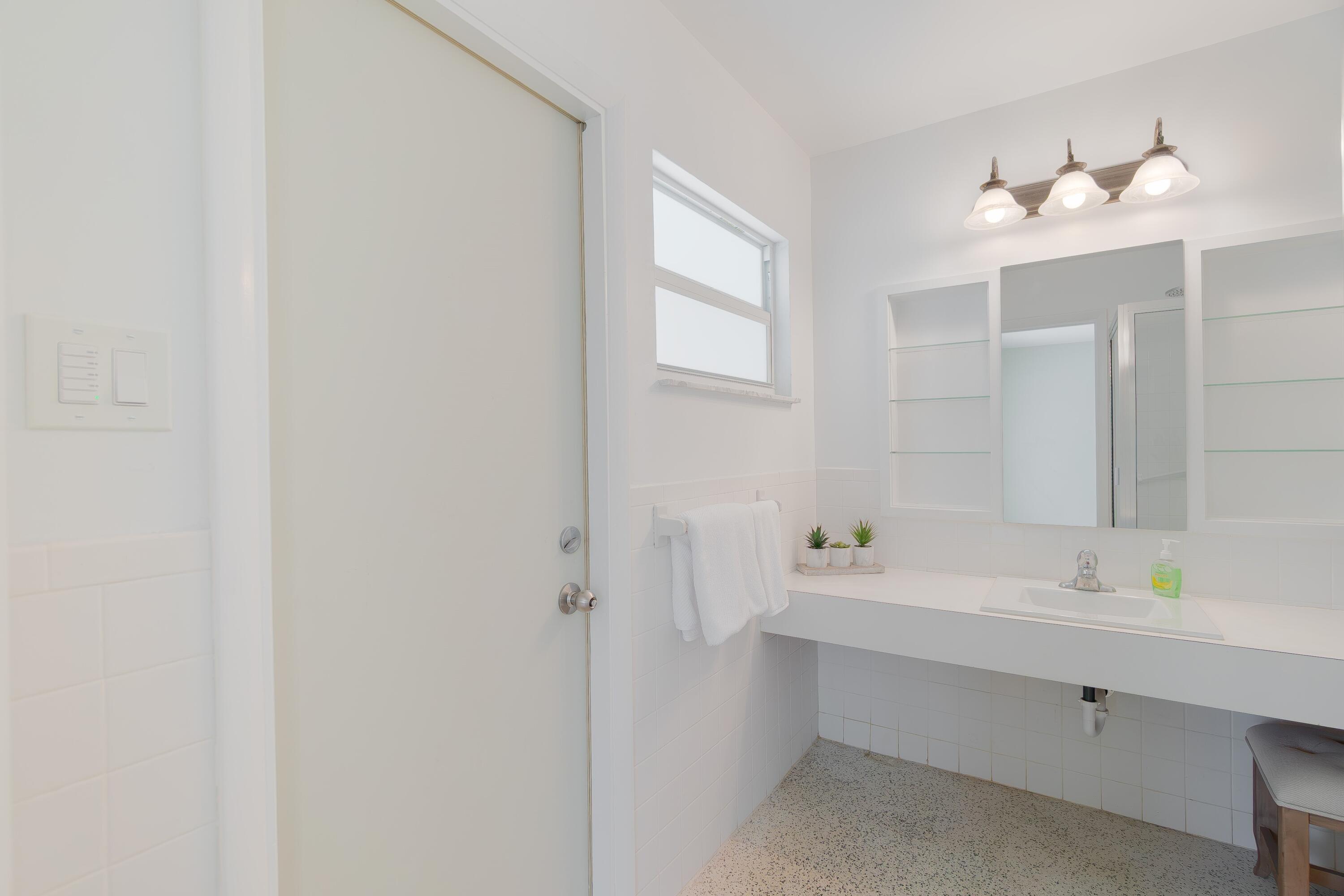 Bathroom with exit to Pool Deck