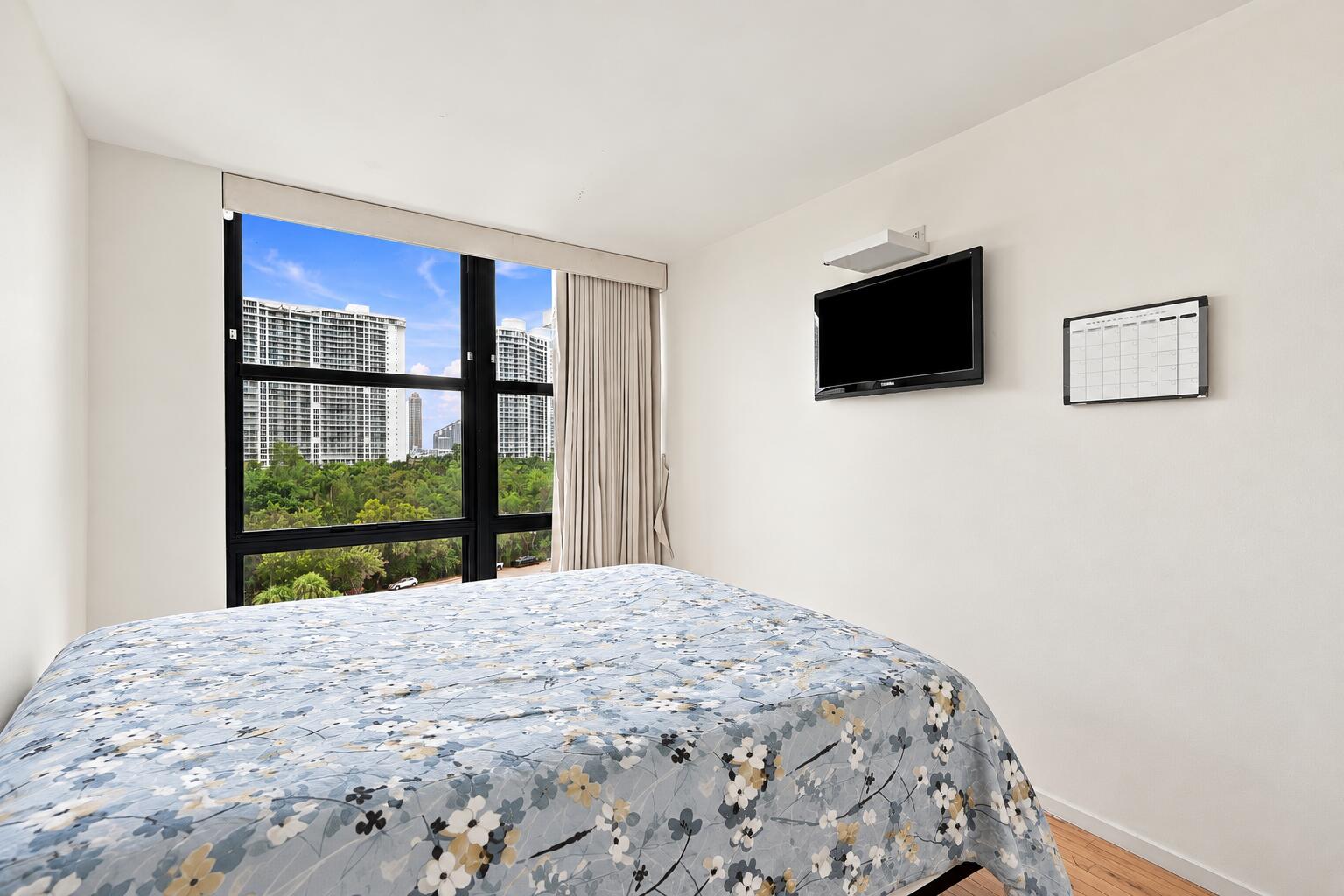 Modern Bedroom with Cityscape View