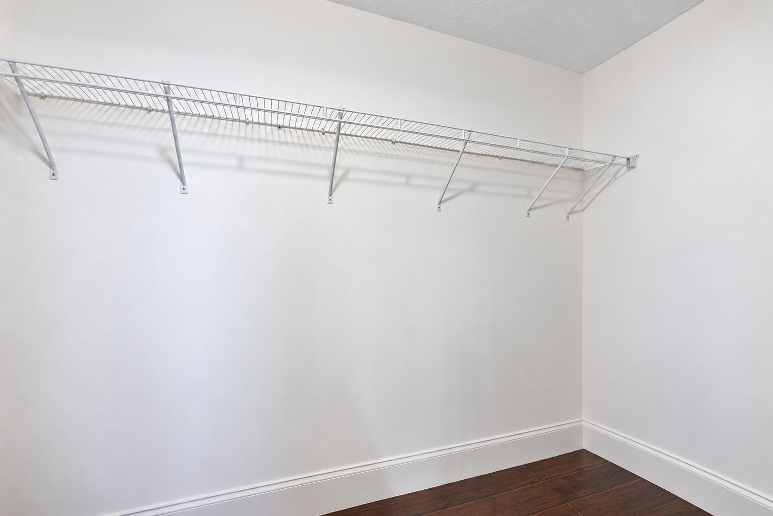 Primary bedroom walk in Closet