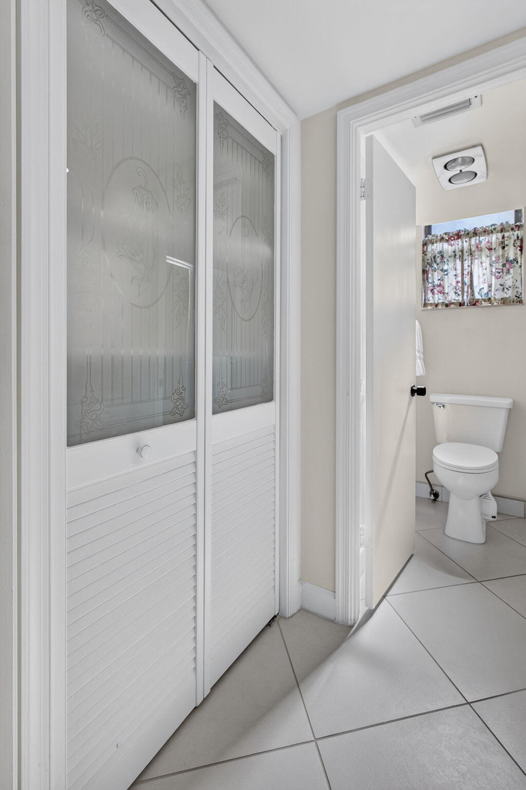 Guest Bathroom with Venetian Bi-fold Storage
