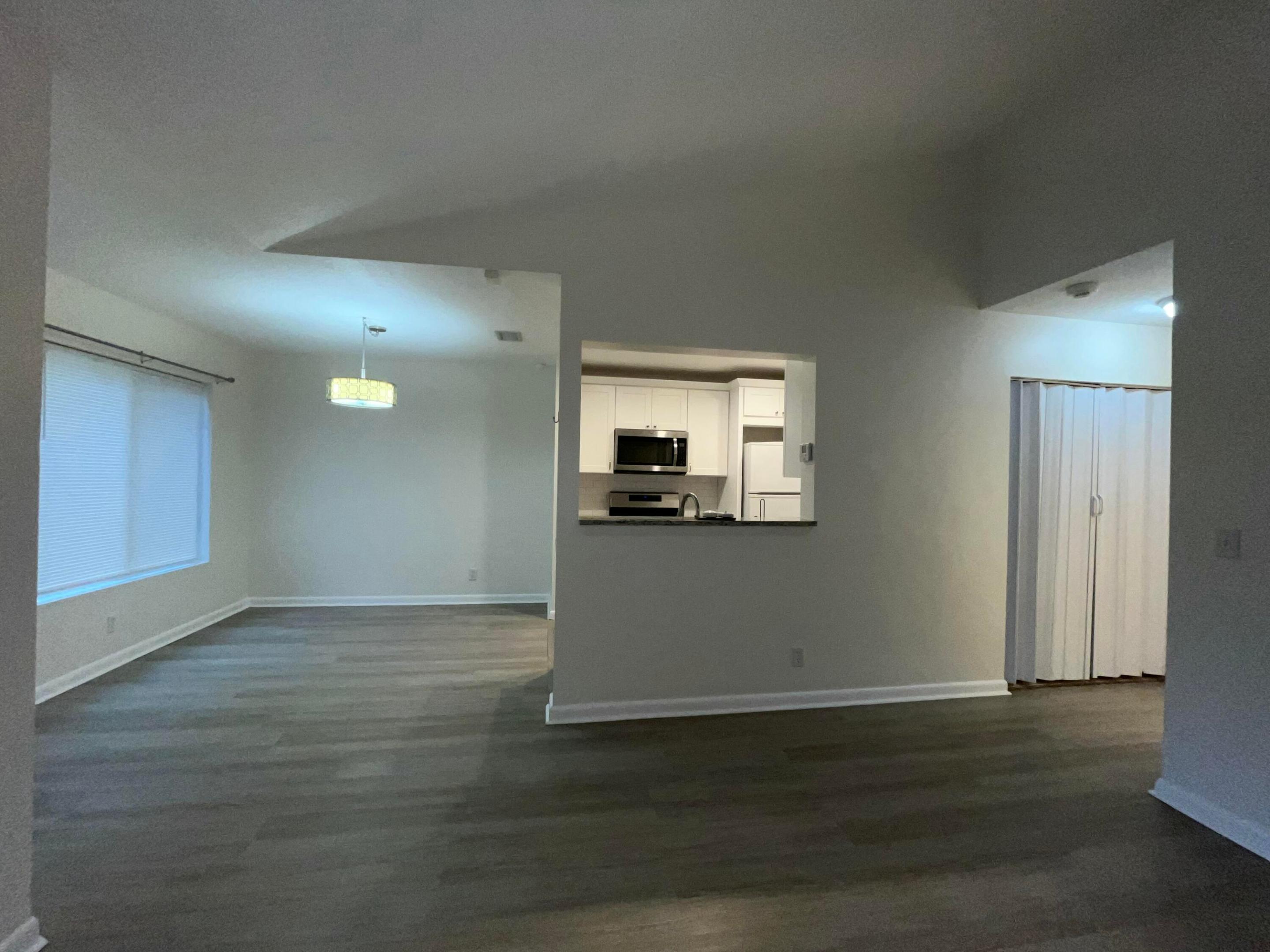 Living room into dining and kitchen