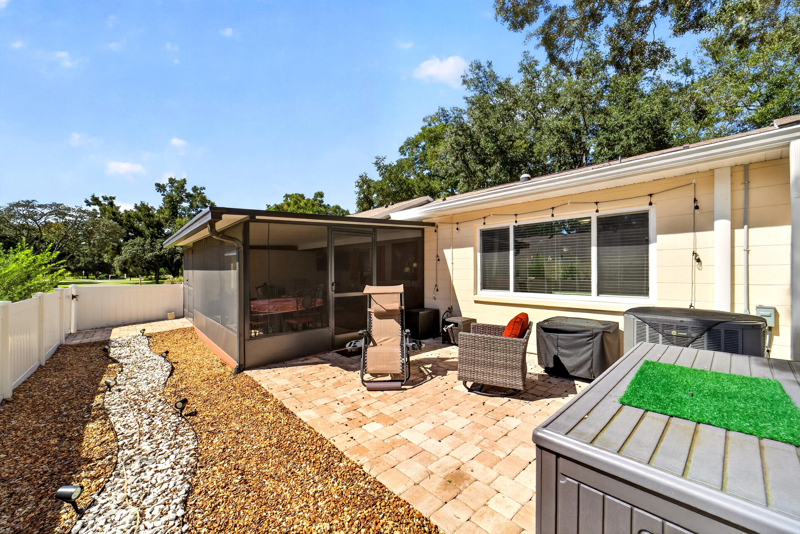 Patio with Pavers and Rocks out Back