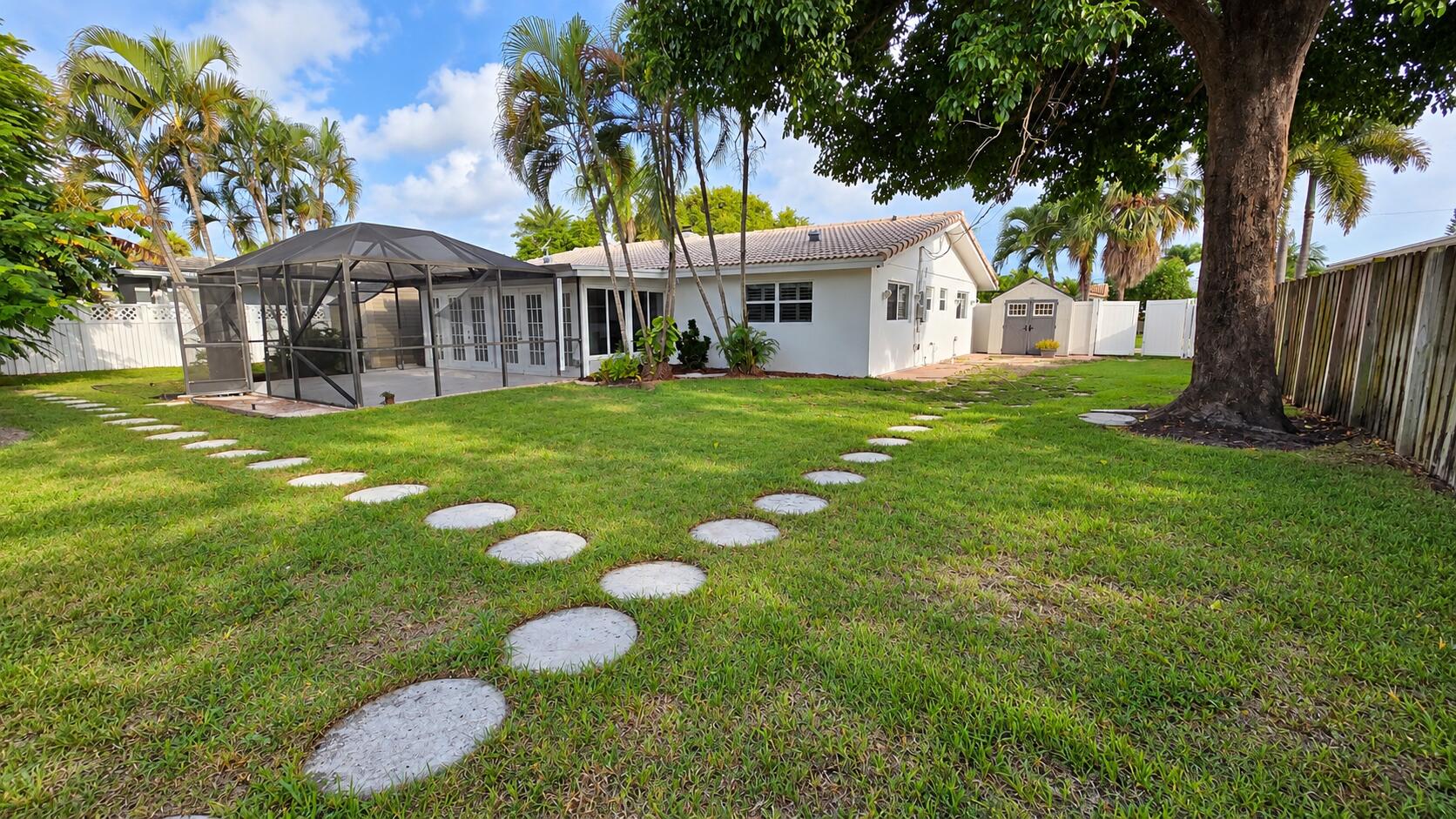 Tropical Backyard with Screened Lanai