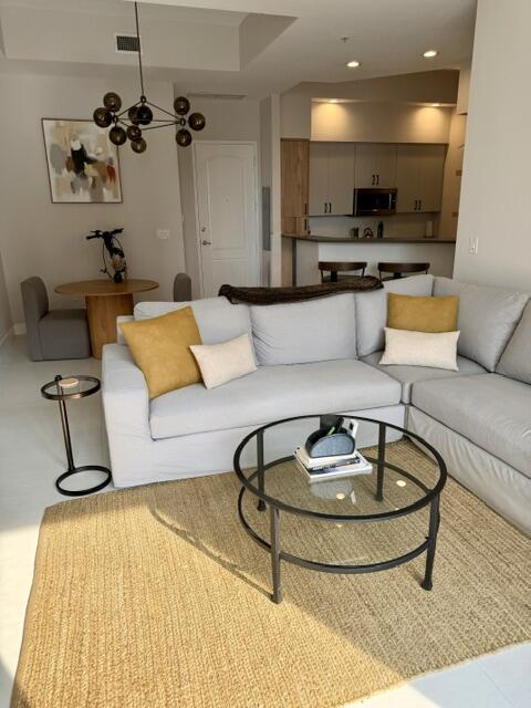 Living Room w/High 11' Ceilings.