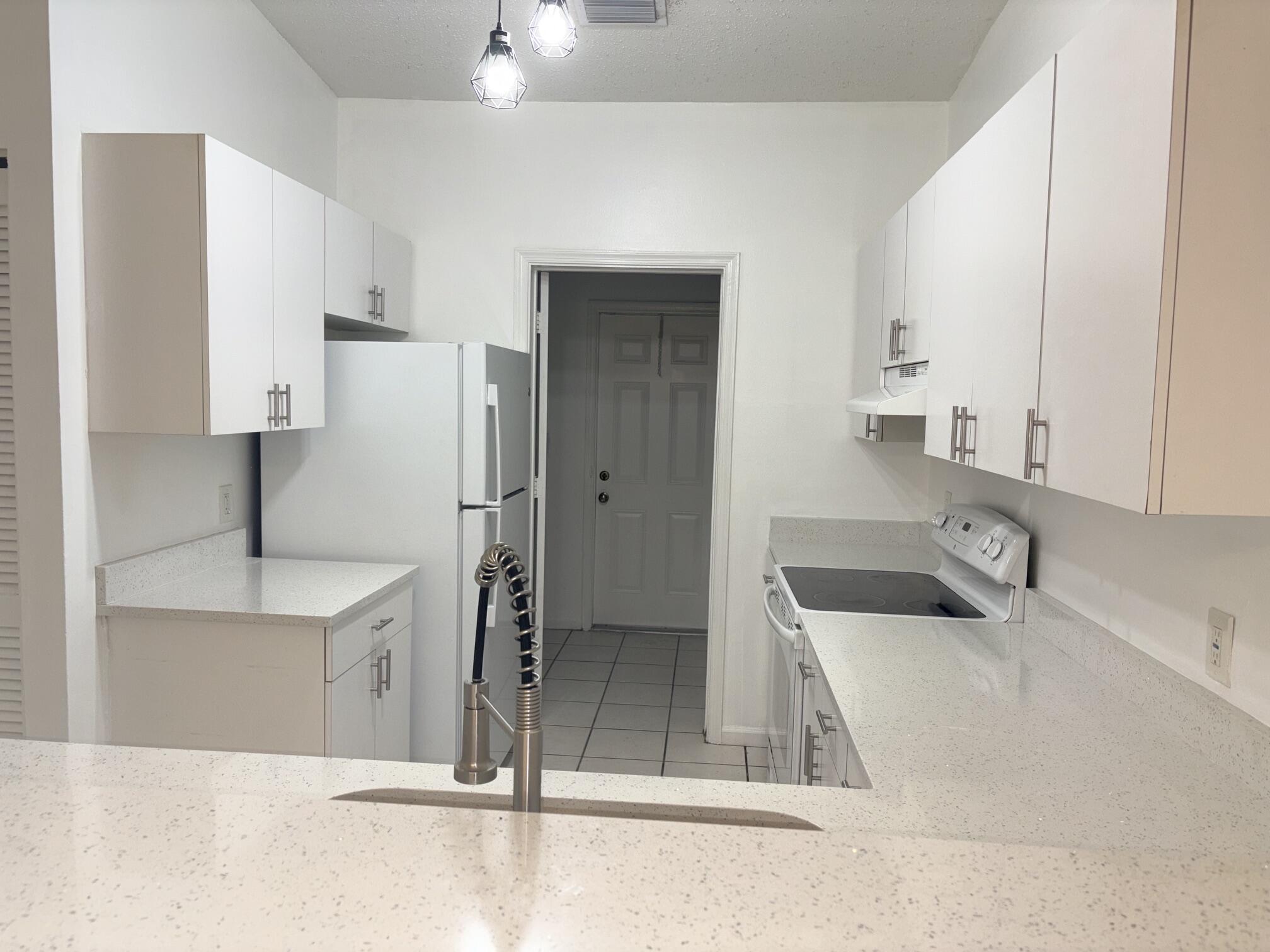 LOOKING INTO THE KITCHEN