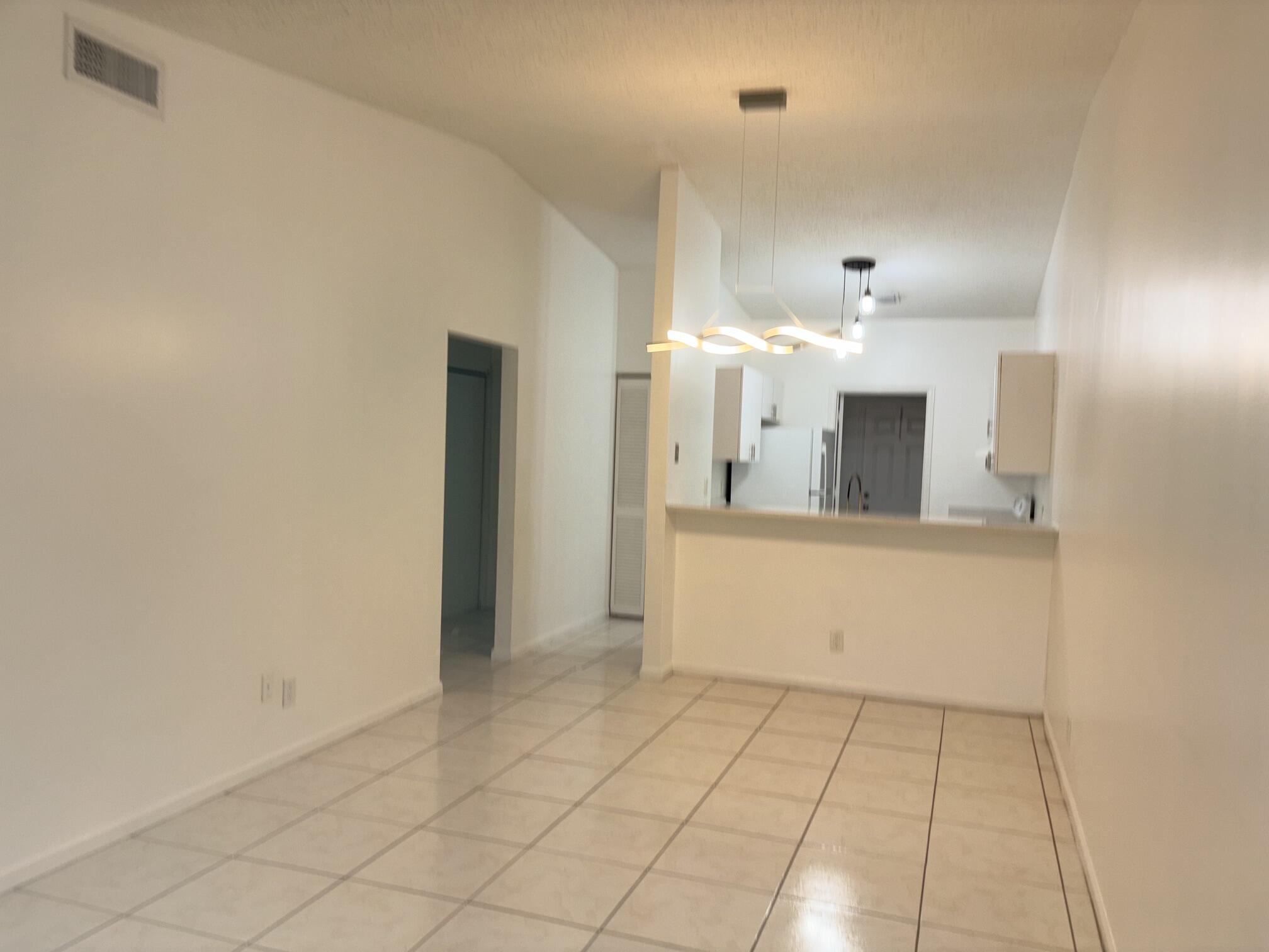 TILE THROUGHOUT, HAS A BREAKFAST BAR PLUS AREA FOR DINING. TILE THROUGHOUT, HAS A BREAKFAST BAR PLUS AREA FOR DINING.