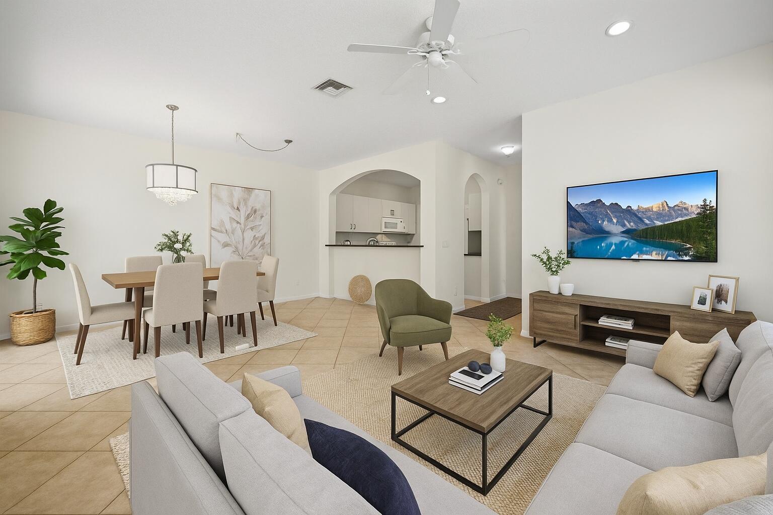 Virtually staged to showcase the spacious living and dining area with an open layout and natural light.