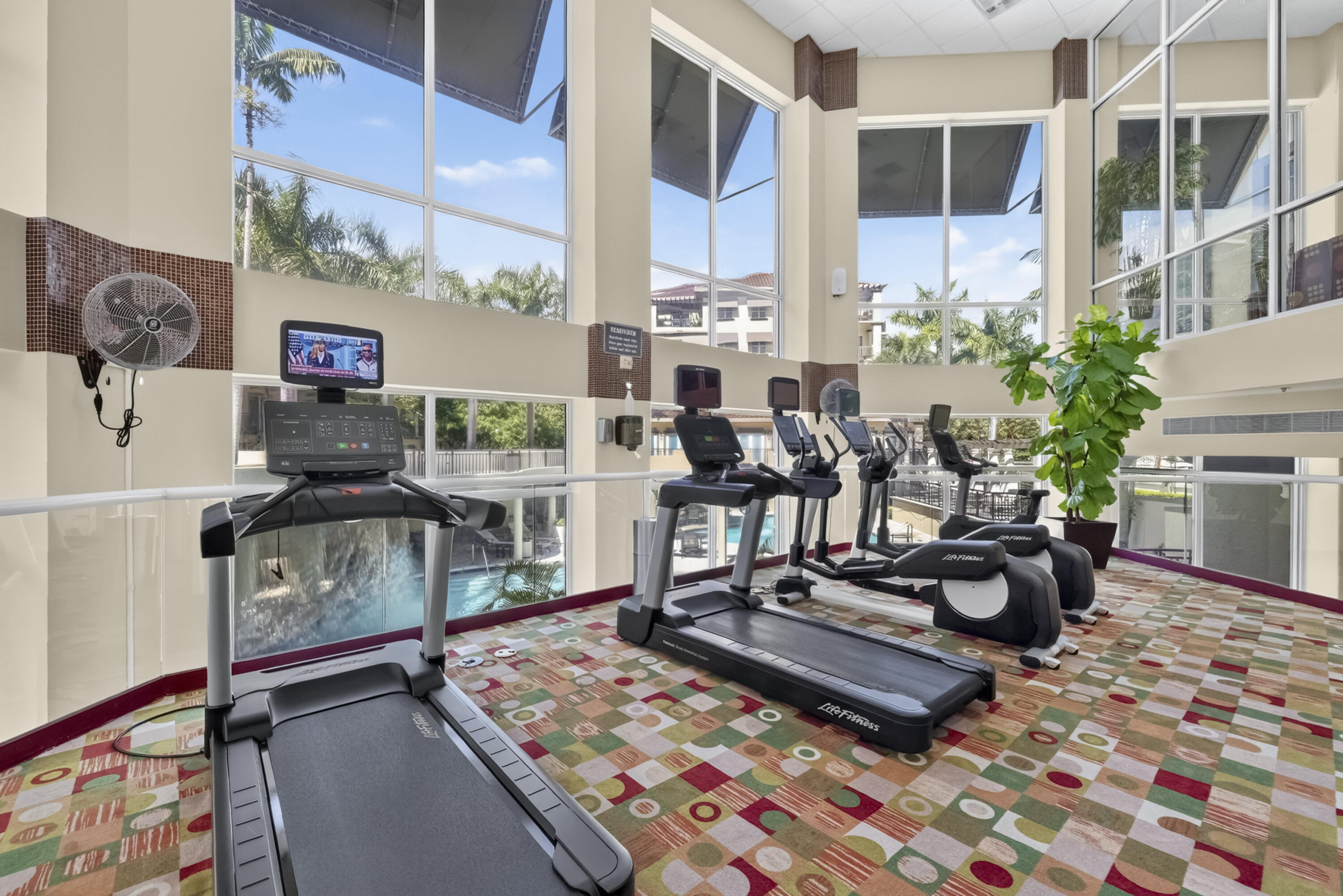 View of pool from gym