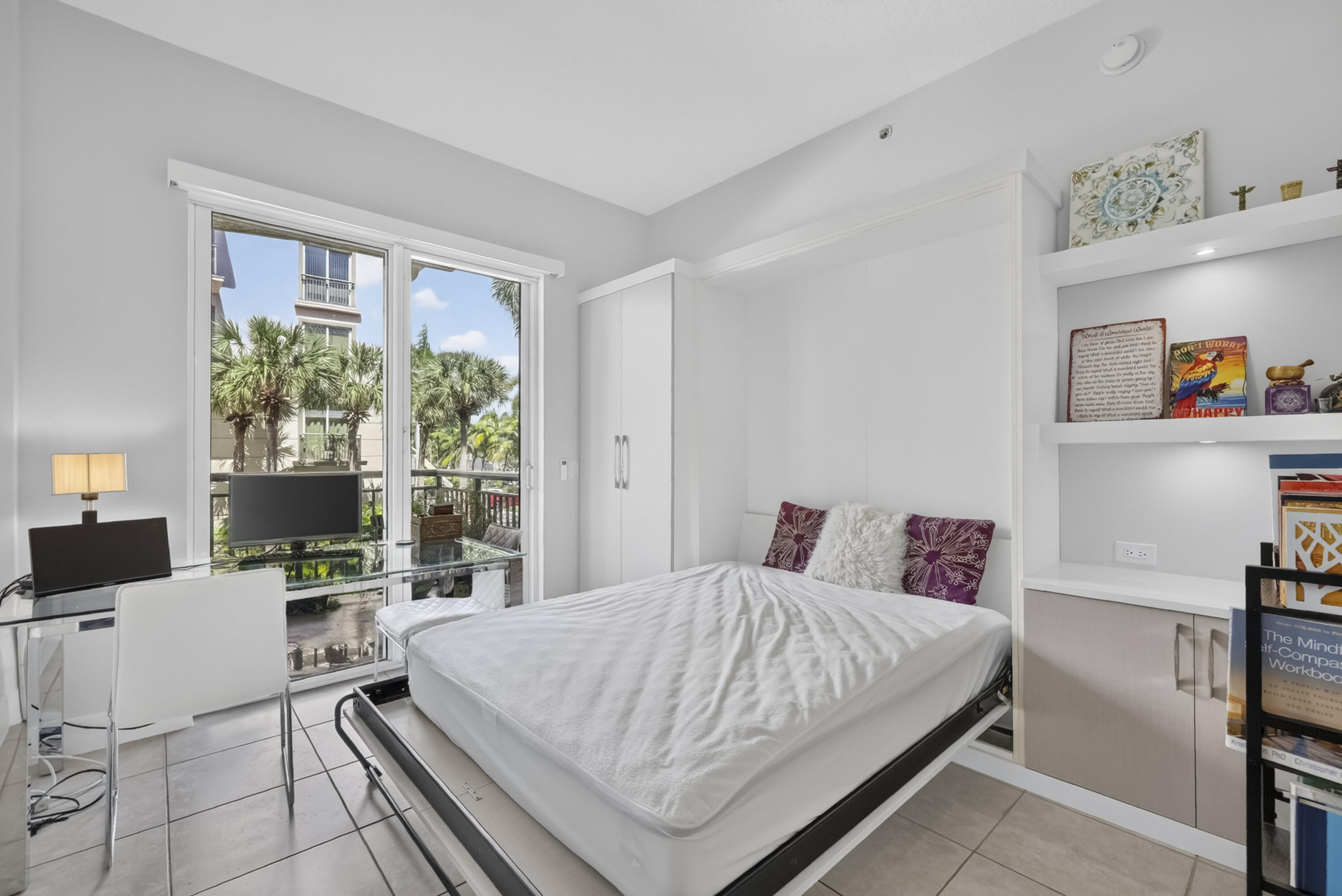 Office/den with open murphy bed, can be used as guest bedroom. Office/den with open murphy bed, can be used as guest bedroom.