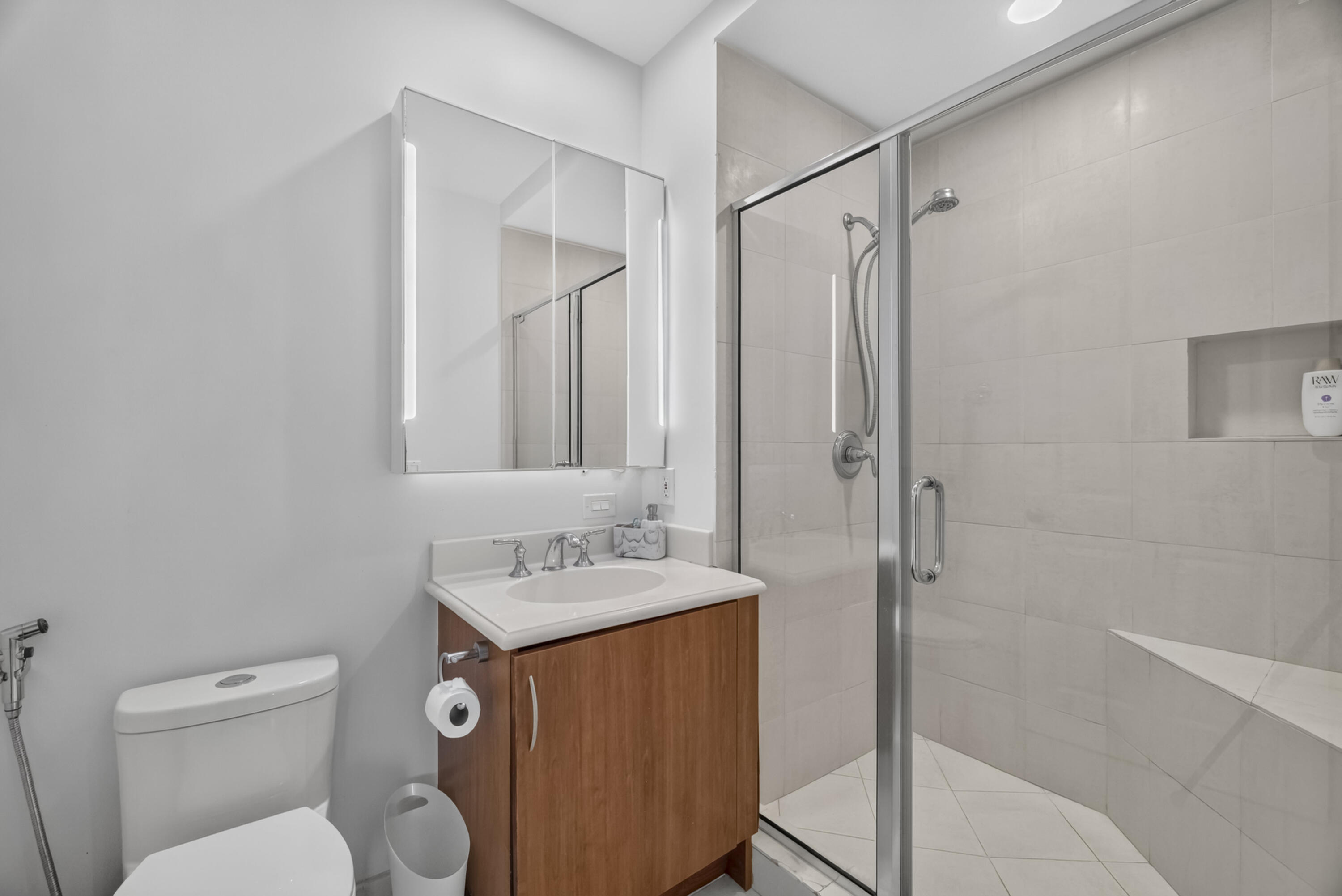 Sedond full bathroom with shower.