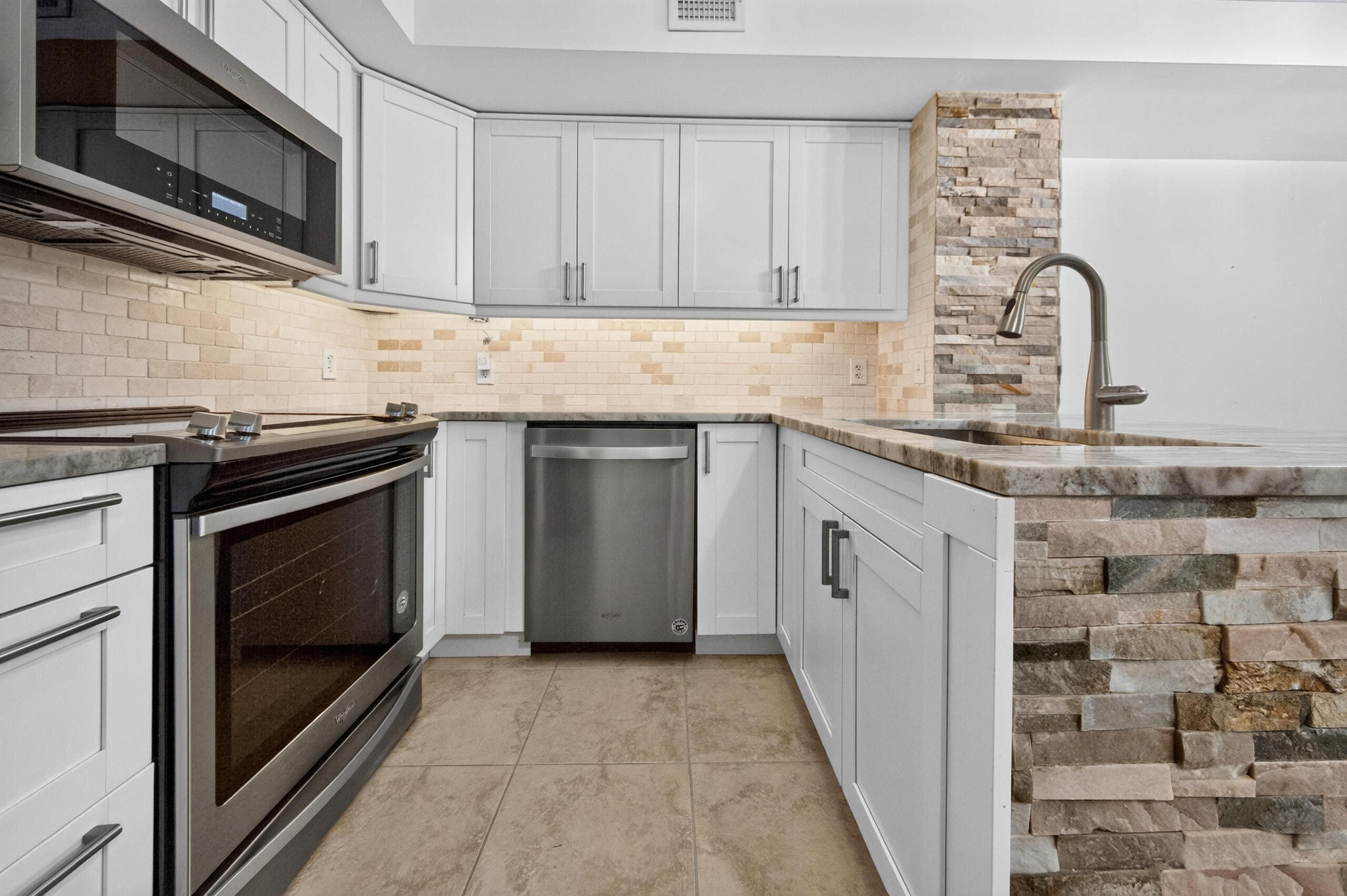 white wood cabinetry, soft closing, accent light