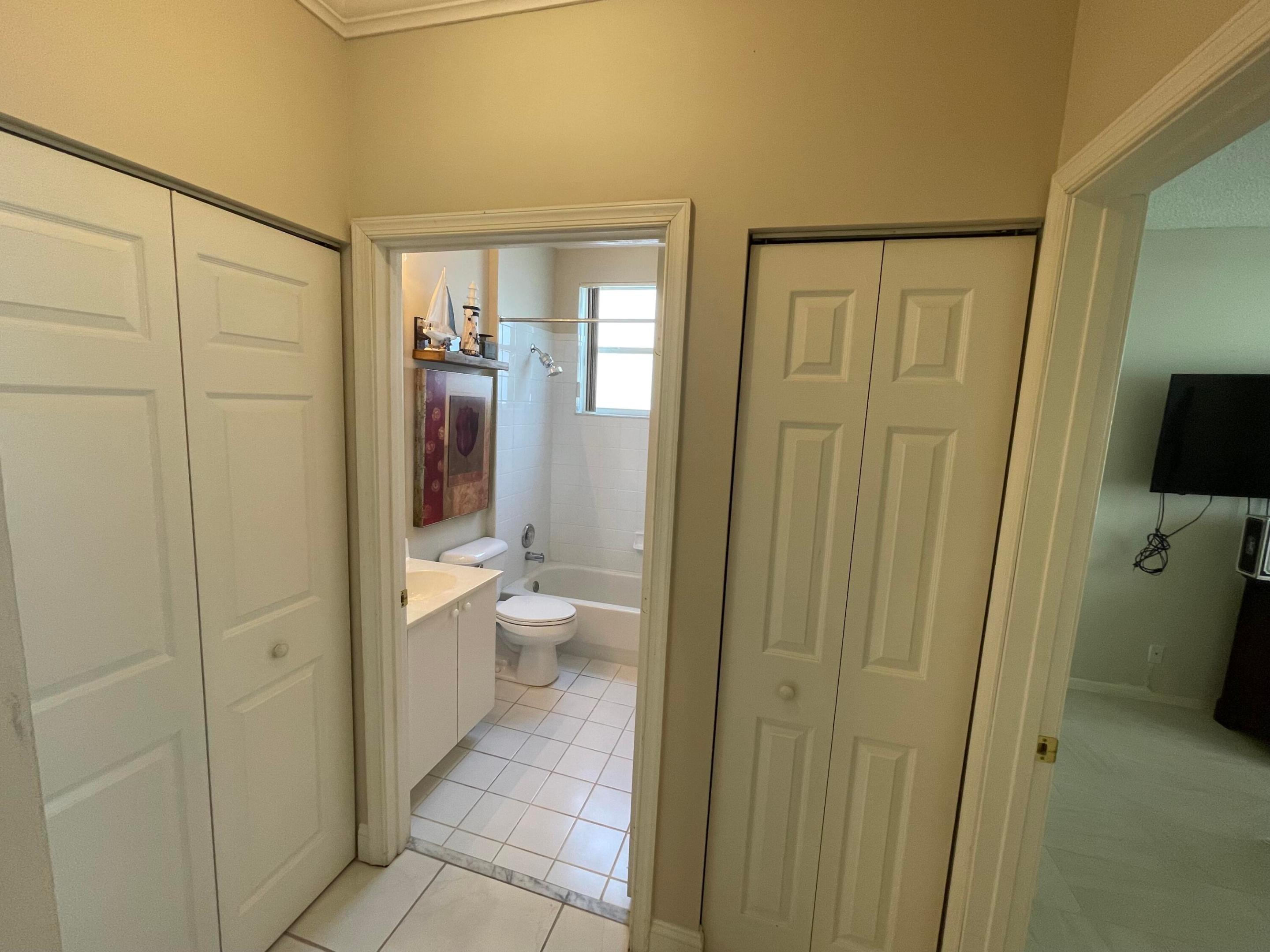 Hallway 2nd bathroom two closets