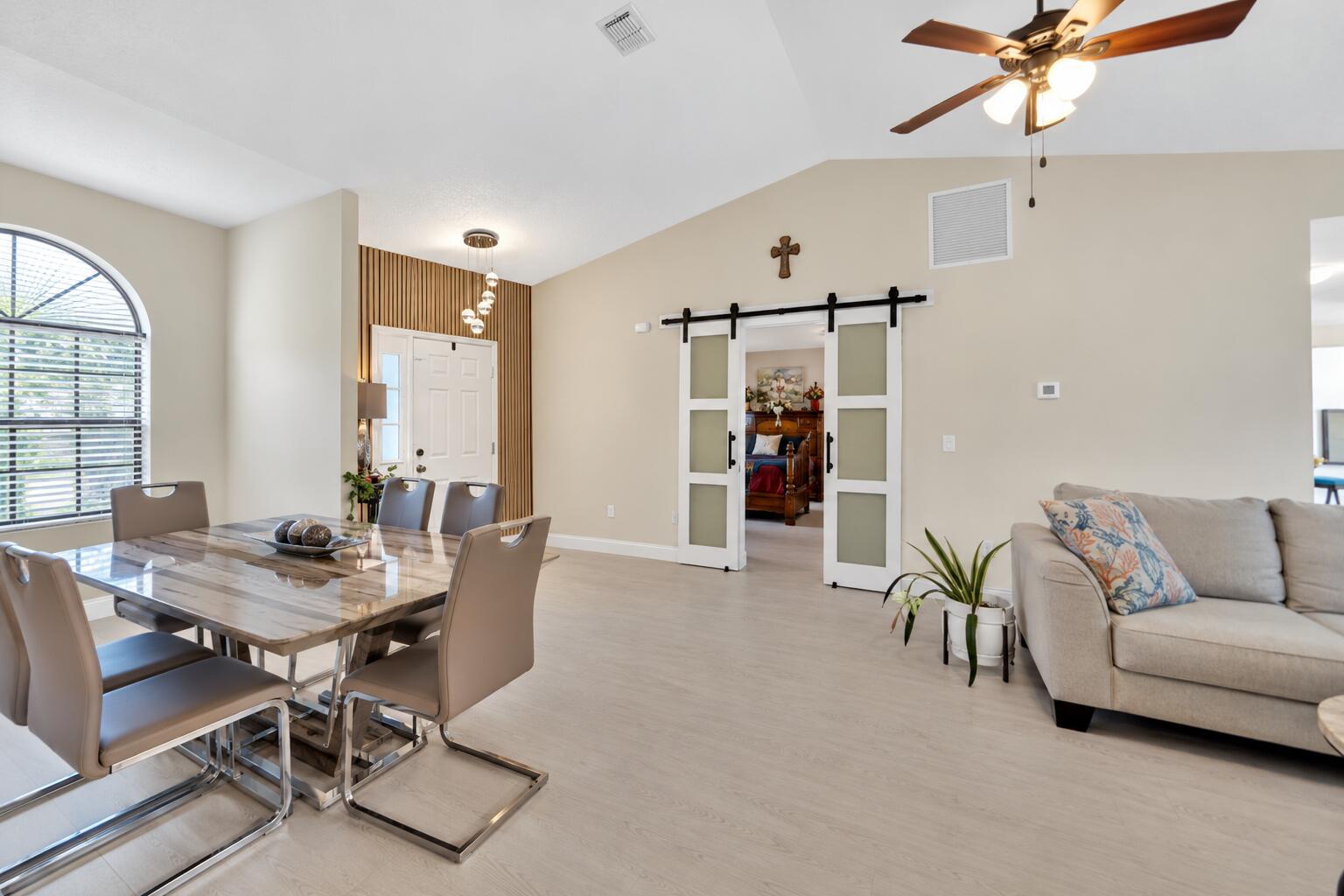 Modern Entryway with Wood Slat Accent Wa