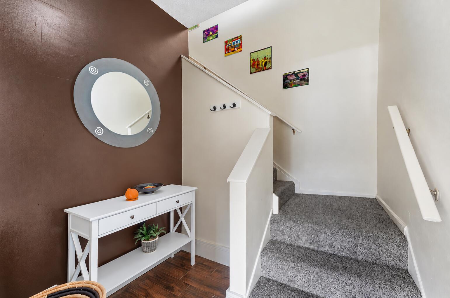 Modern Foyer with Pumpkin and Stairway