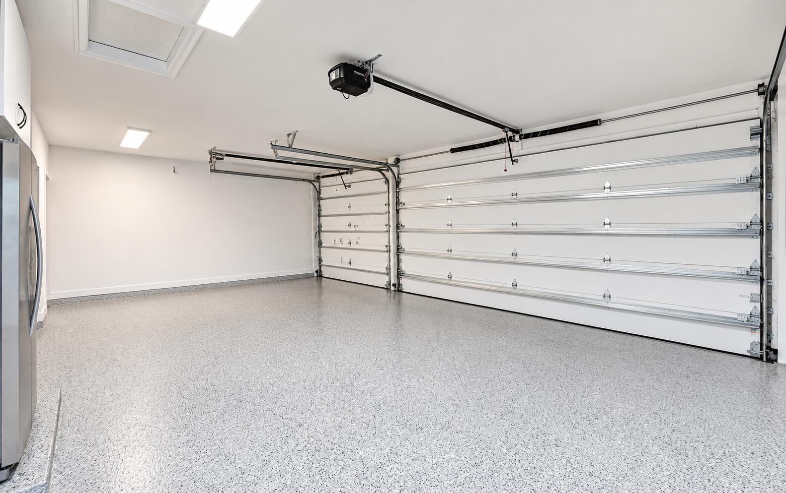 New epoxy floors, newly installed impact garage doors and remoteless garage door openers.