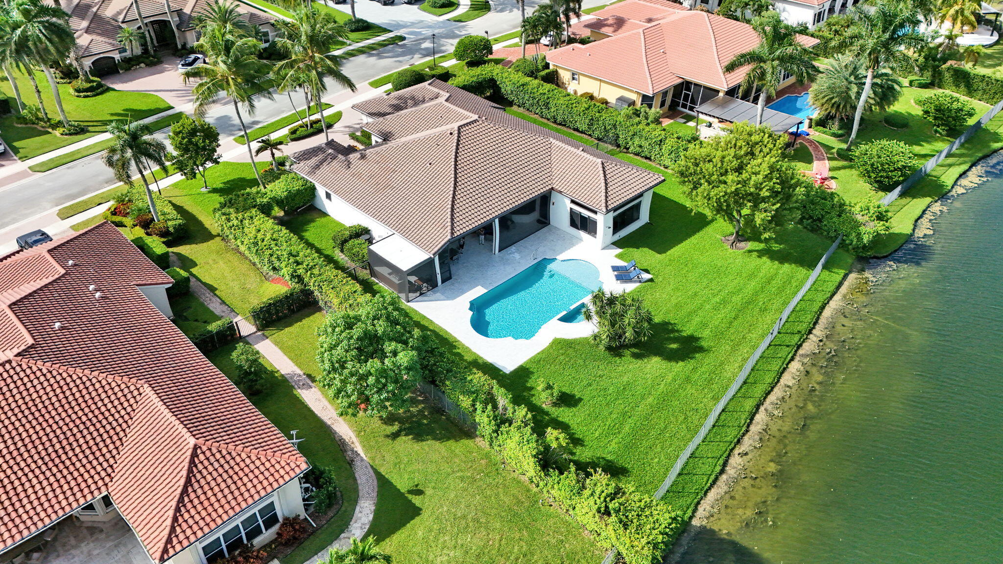 Acreage pool home with lakefront views