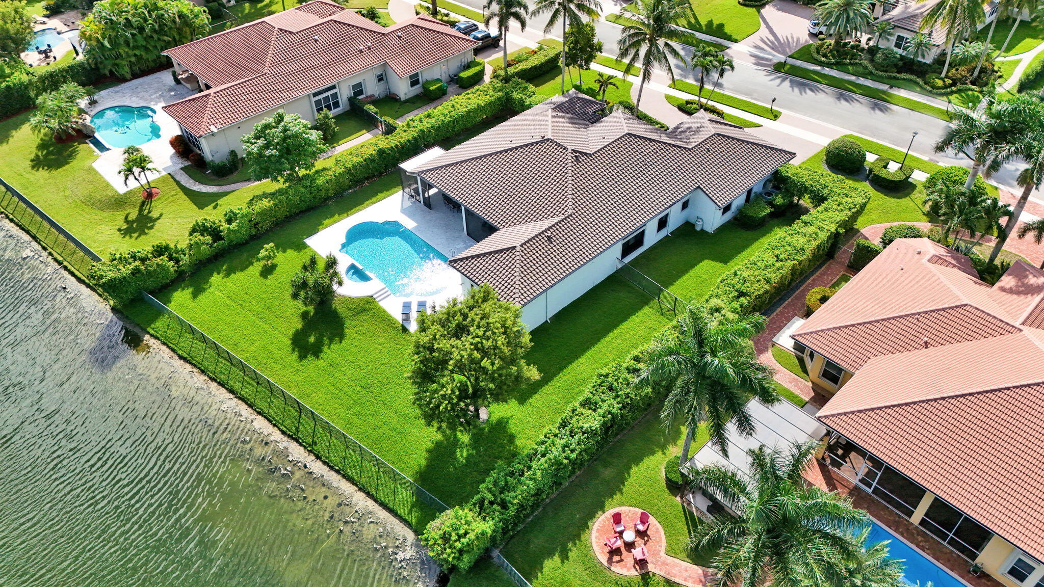 Fully fenced yard with privacy hedges