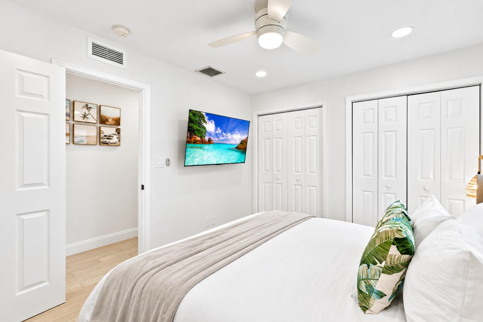 Bright Coastal Bedroom with Tropical Vie