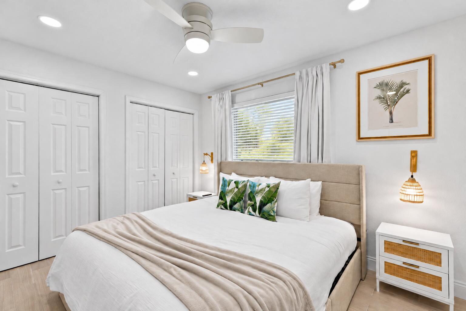 Bright Coastal Bedroom with Tropical Acc