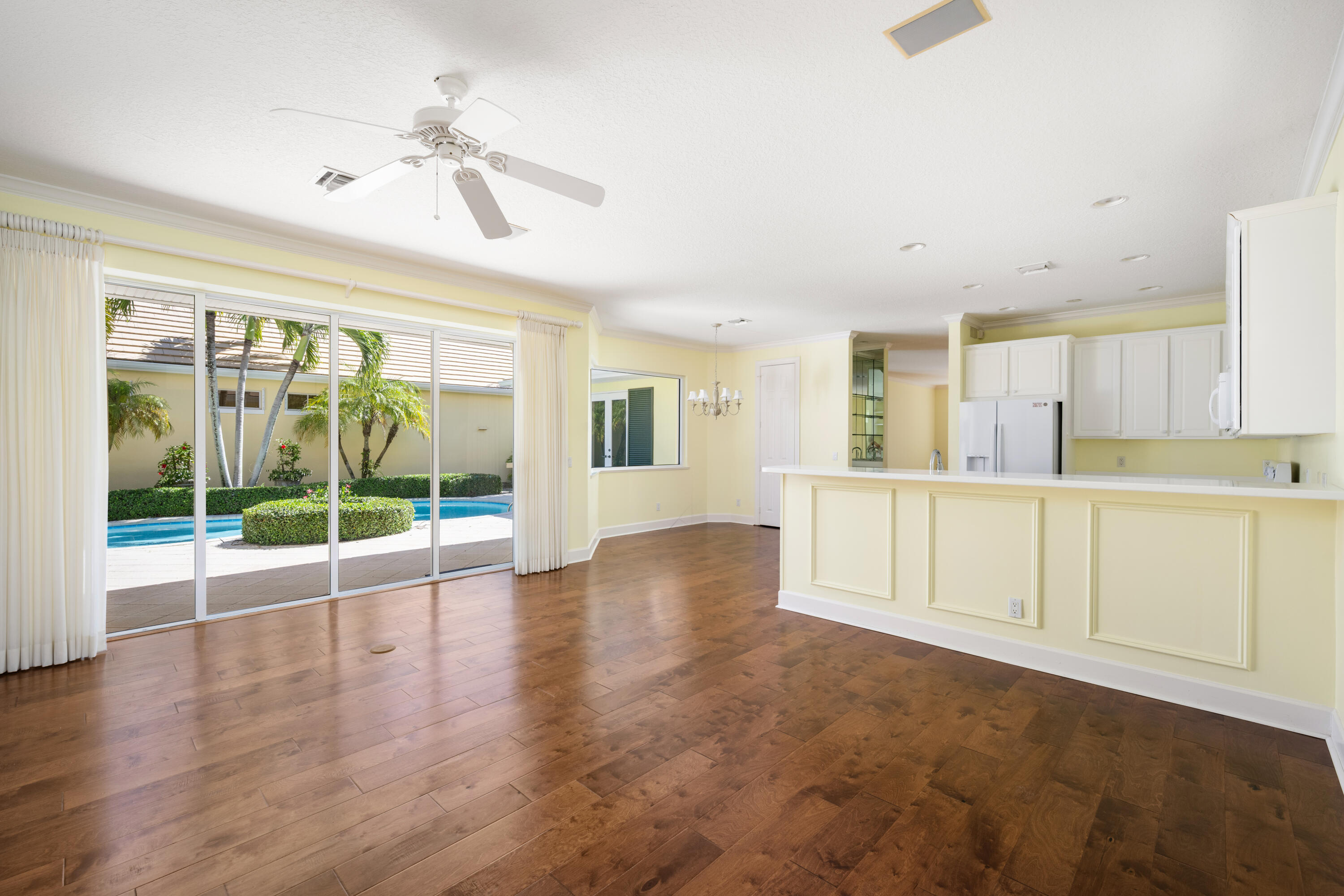 Enjoy cooking and entertaining? Cozy or formal? This home has it all including fully opening sliders to pool