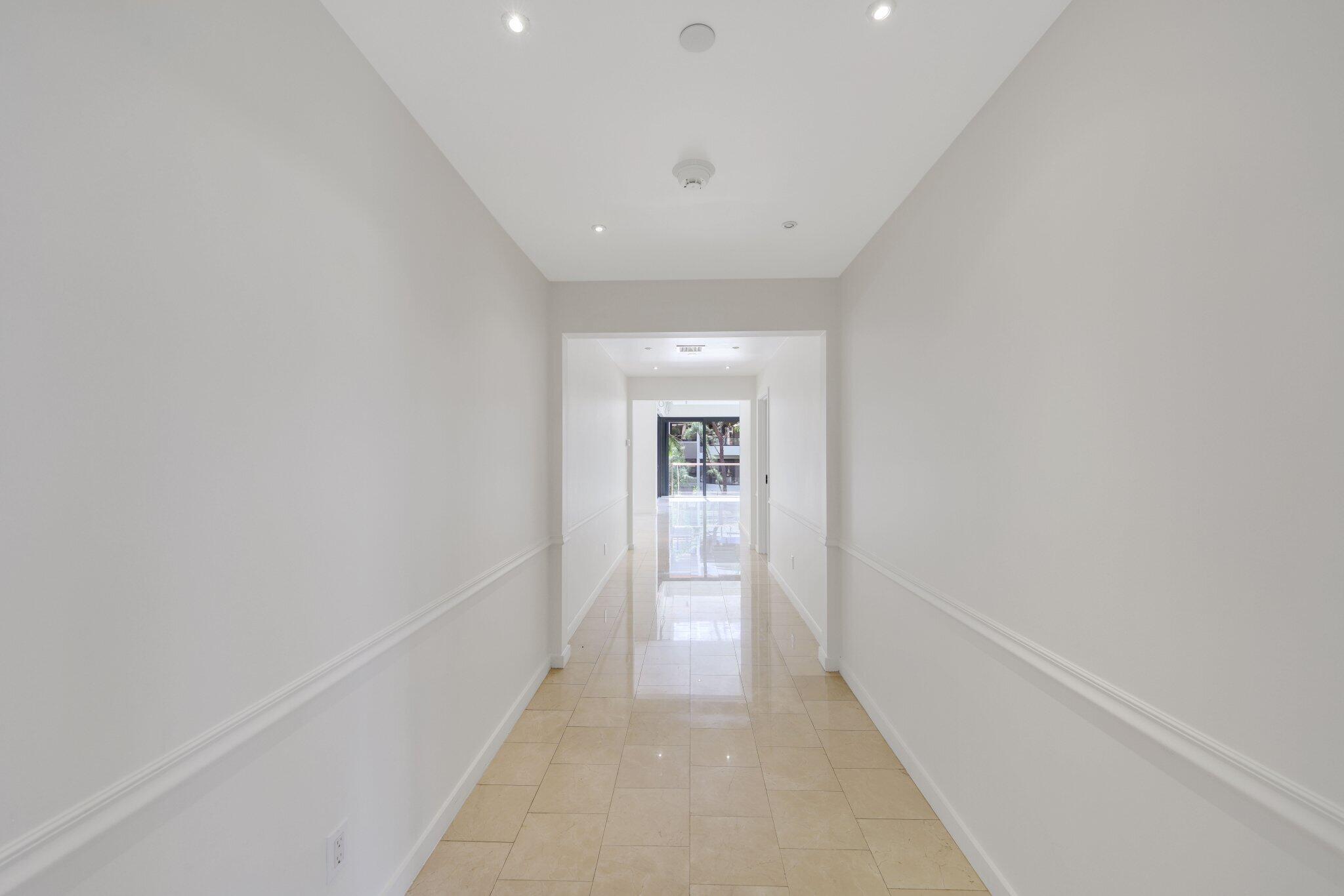 Hallway to Living Areas and Two Guest Bedrooms