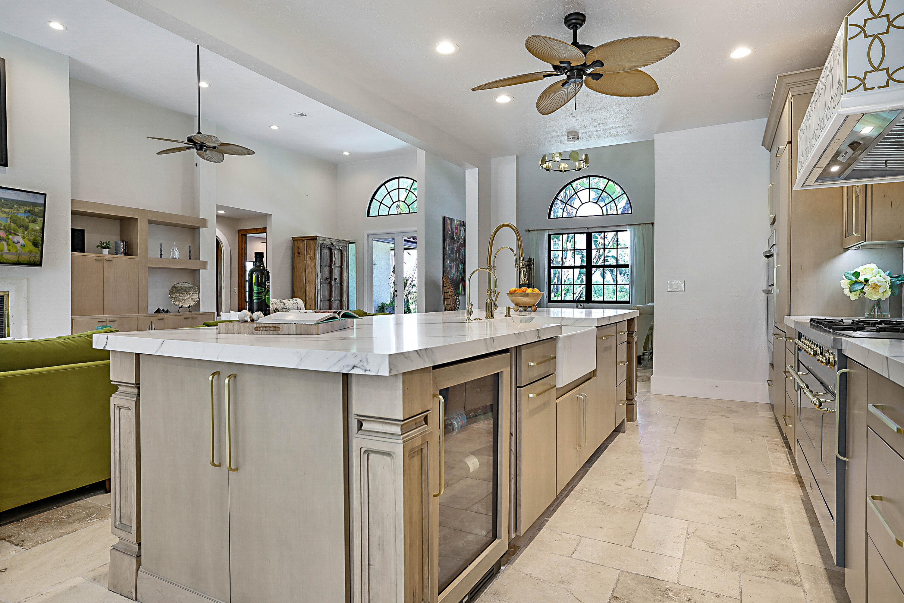 Beverage Fridge, soft close drawers and roll-out cabinets, undermount and decorative cabinet lighting
