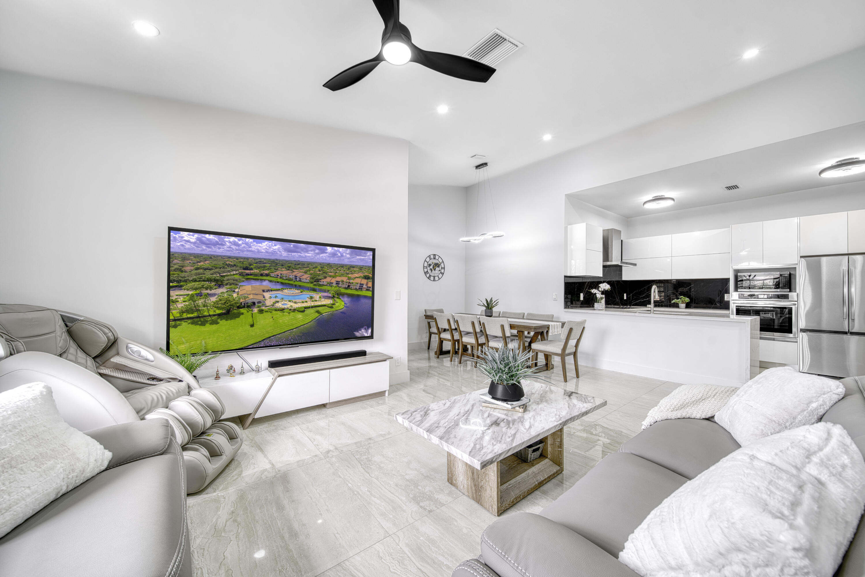 Bright, open living area with soaring 14-foot ceilings.