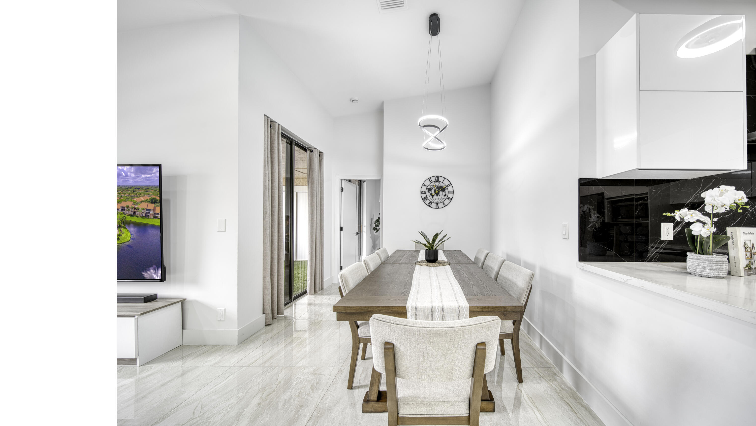 Dining area conveniently located beside the renovated kitchen.