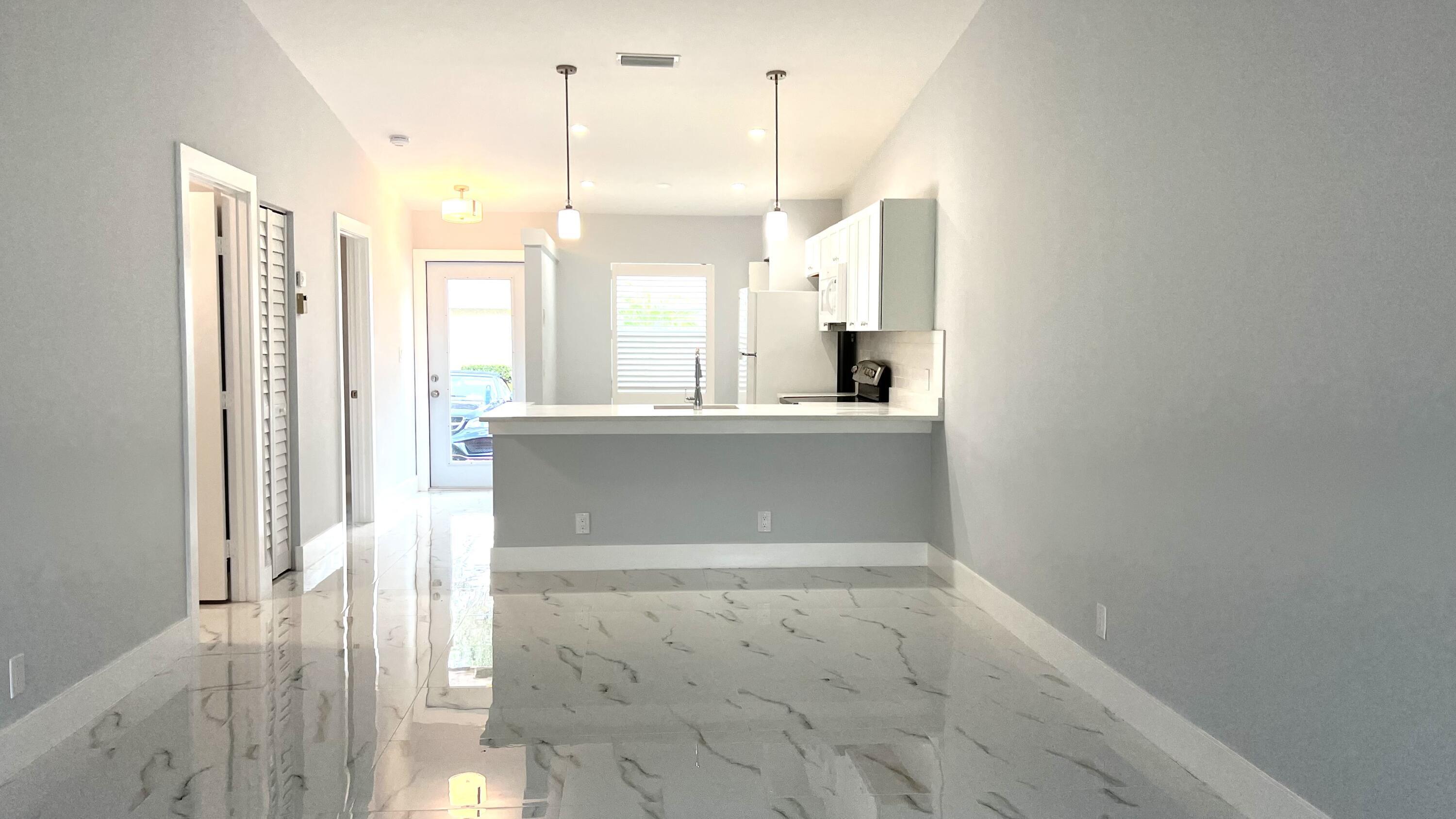 View from living area to open kitchen