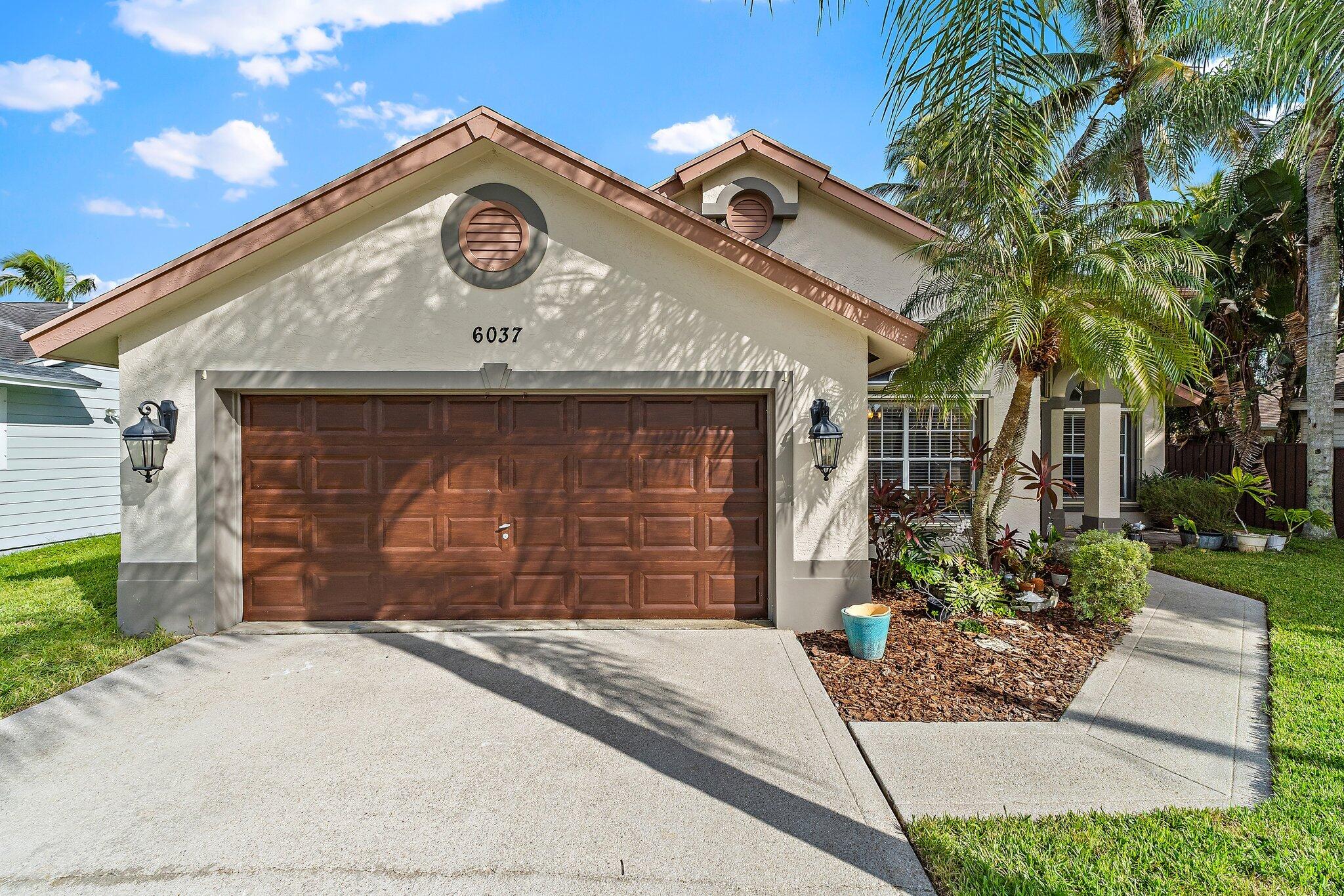 Attached 2-car garage and driveway.