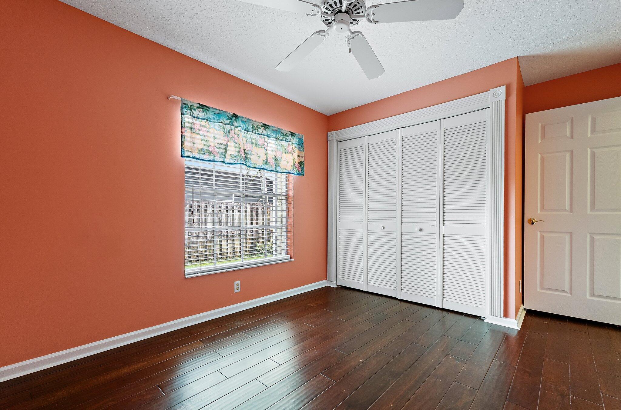 Guest bedroom with a double closet.